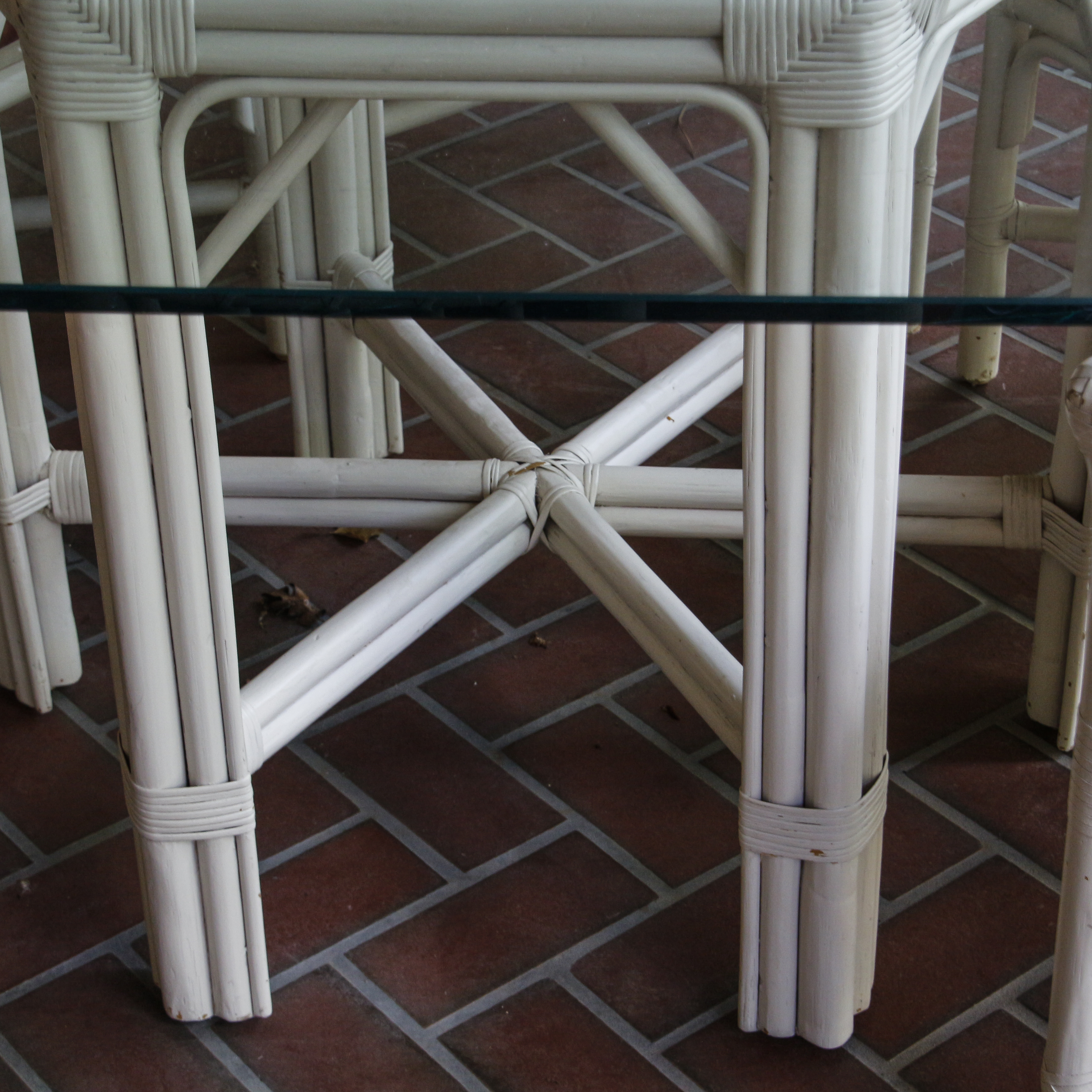 Glass Top Patio Table with White Painted Rattan Armchairs