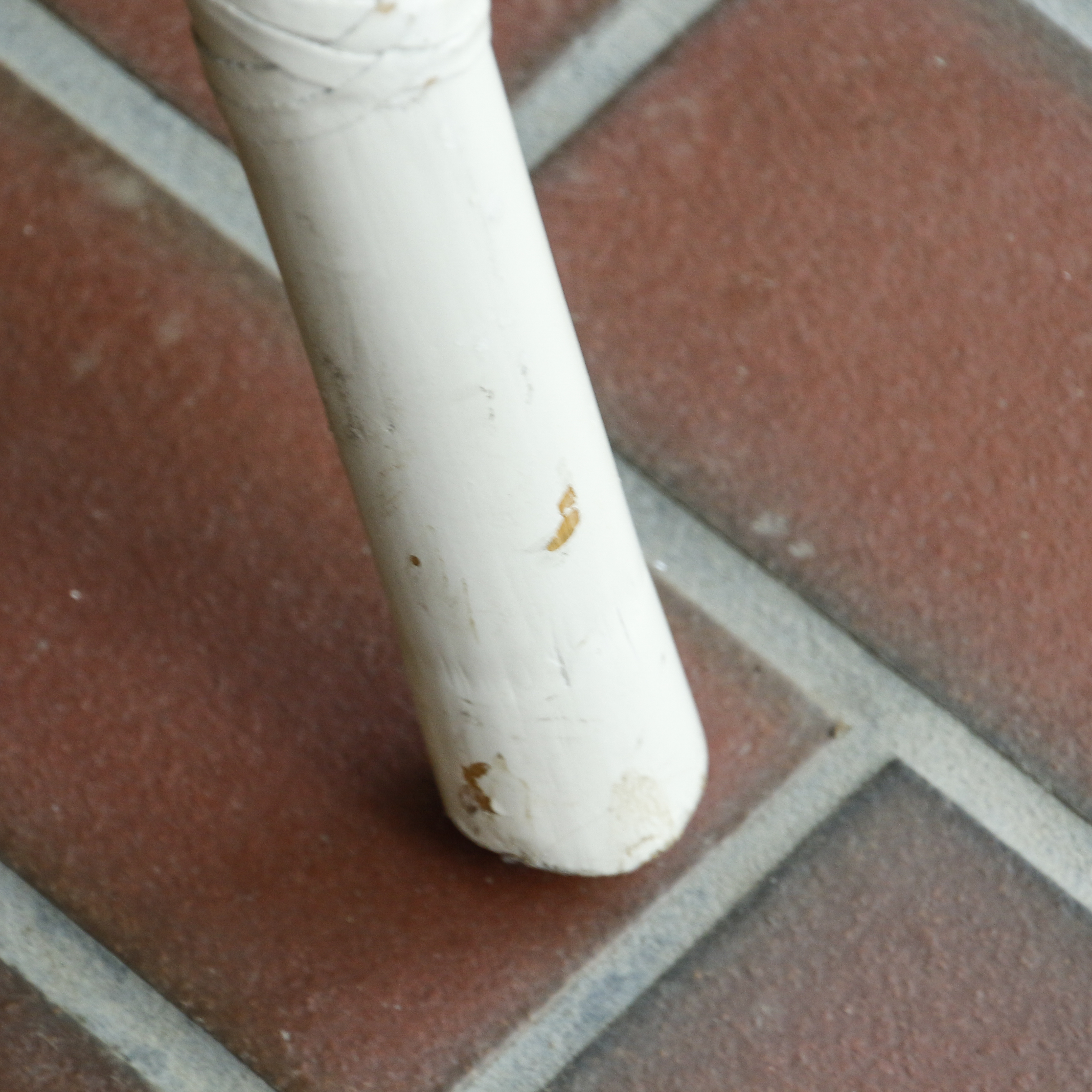 Glass Top Patio Table with White Painted Rattan Armchairs