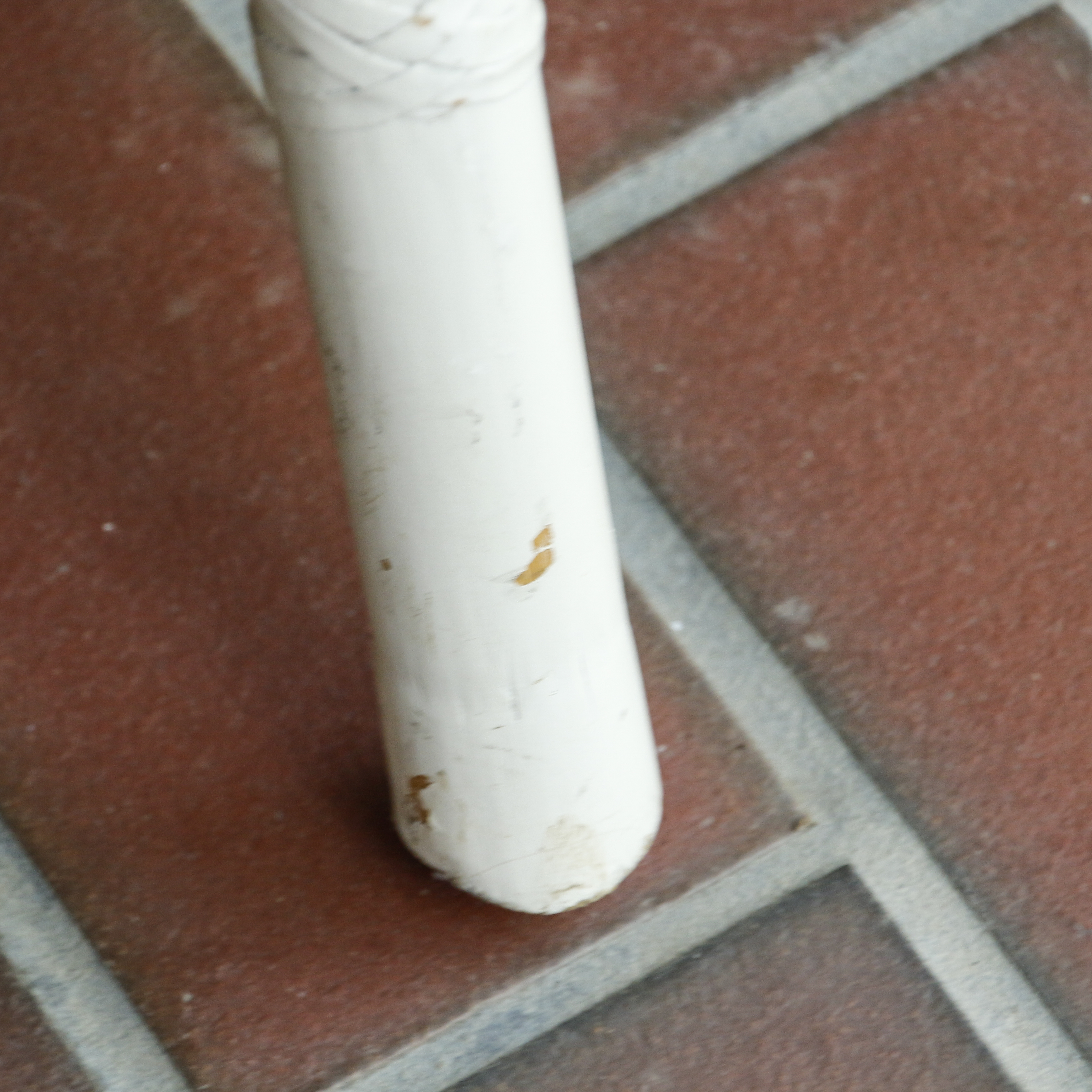 Glass Top Patio Table with White Painted Rattan Armchairs