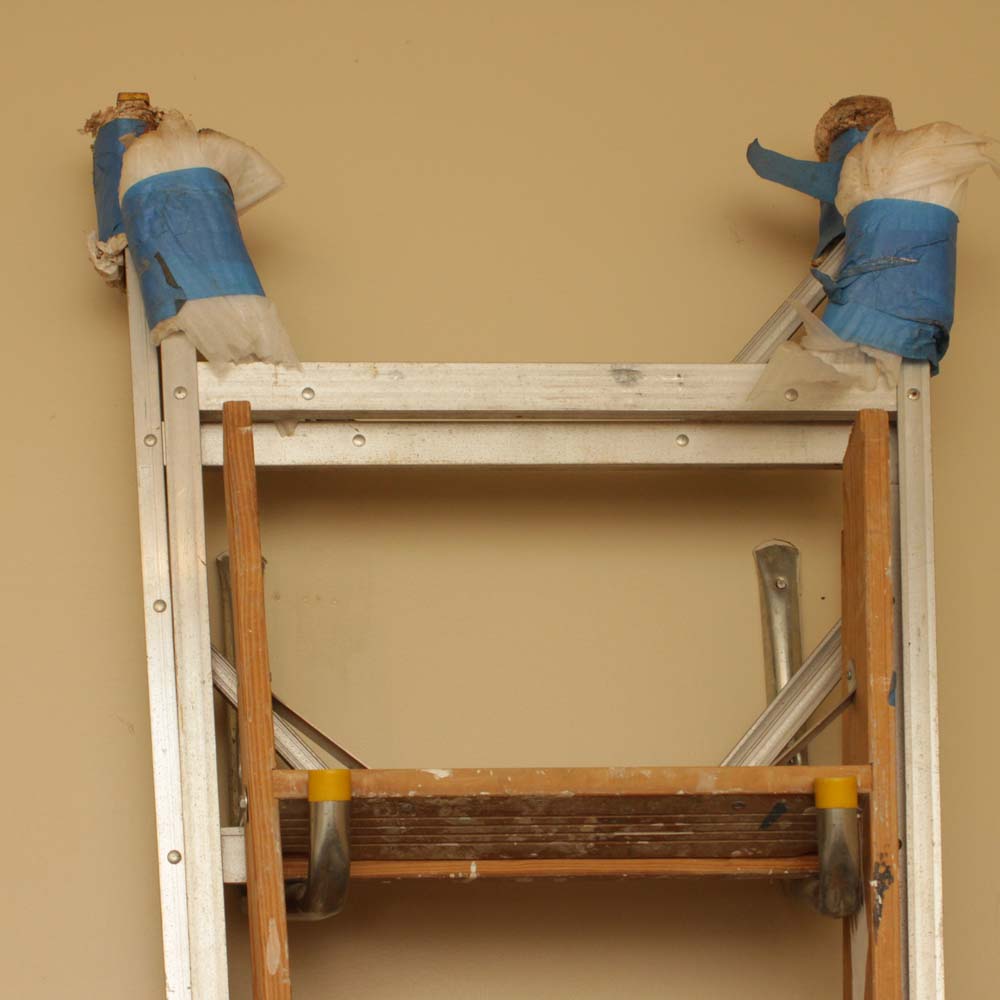 Werner Wood and Aluminum Step Ladders