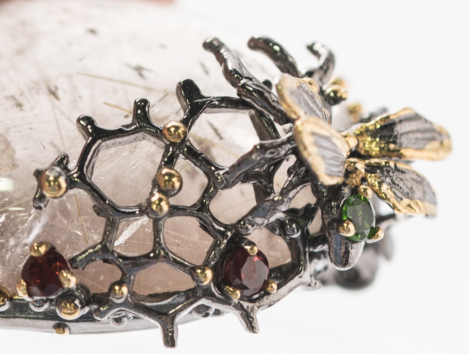 Sterling Silver, 46.60 CT Rutilated Quartz, Peridot, and Garnet Bee Brooch