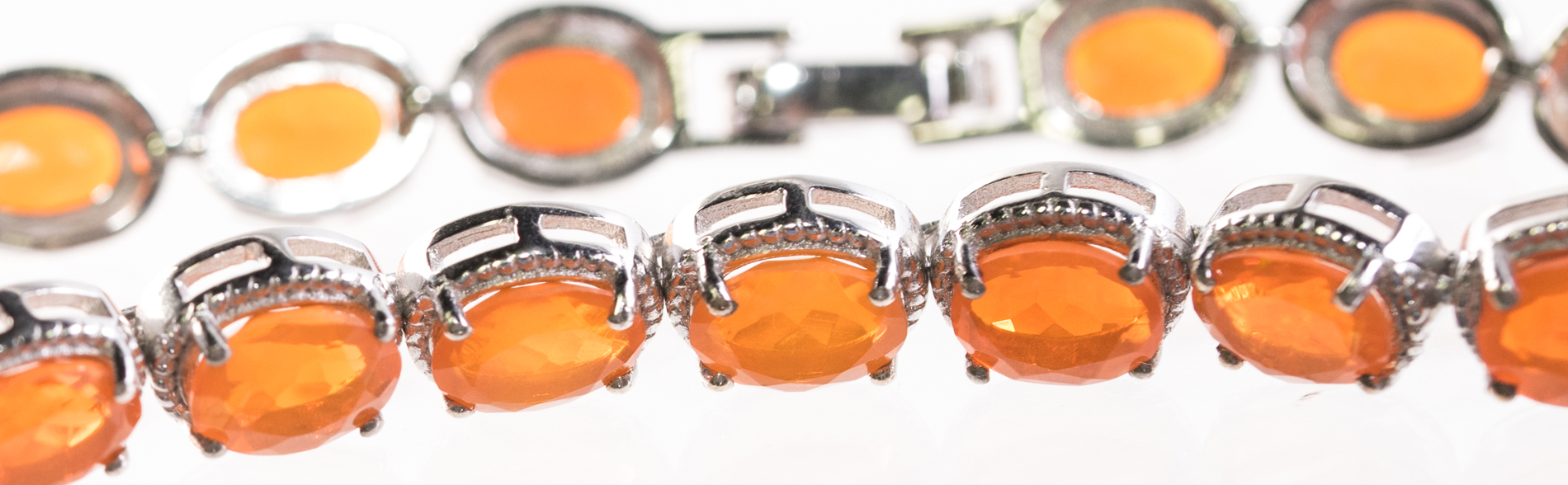 Sterling Silver and 13.50 CTW Fire Opal Tennis Bracelet