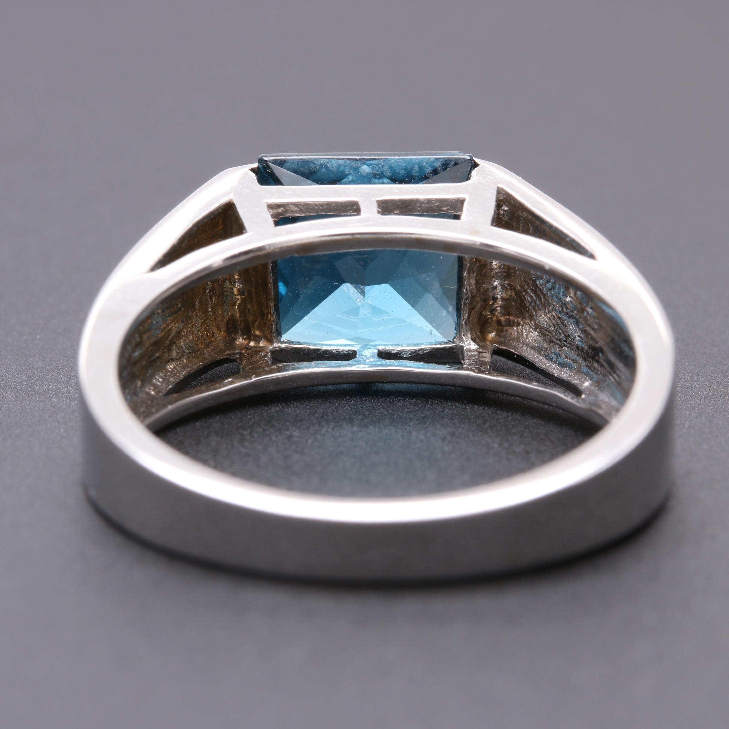 14K White Gold Blue Topaz Ring