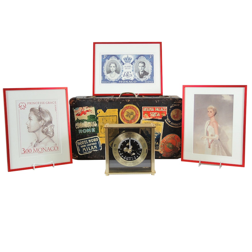 World Traveled Suitcase with Stickers, Seiko World Clock and Monaco Stamp Prints