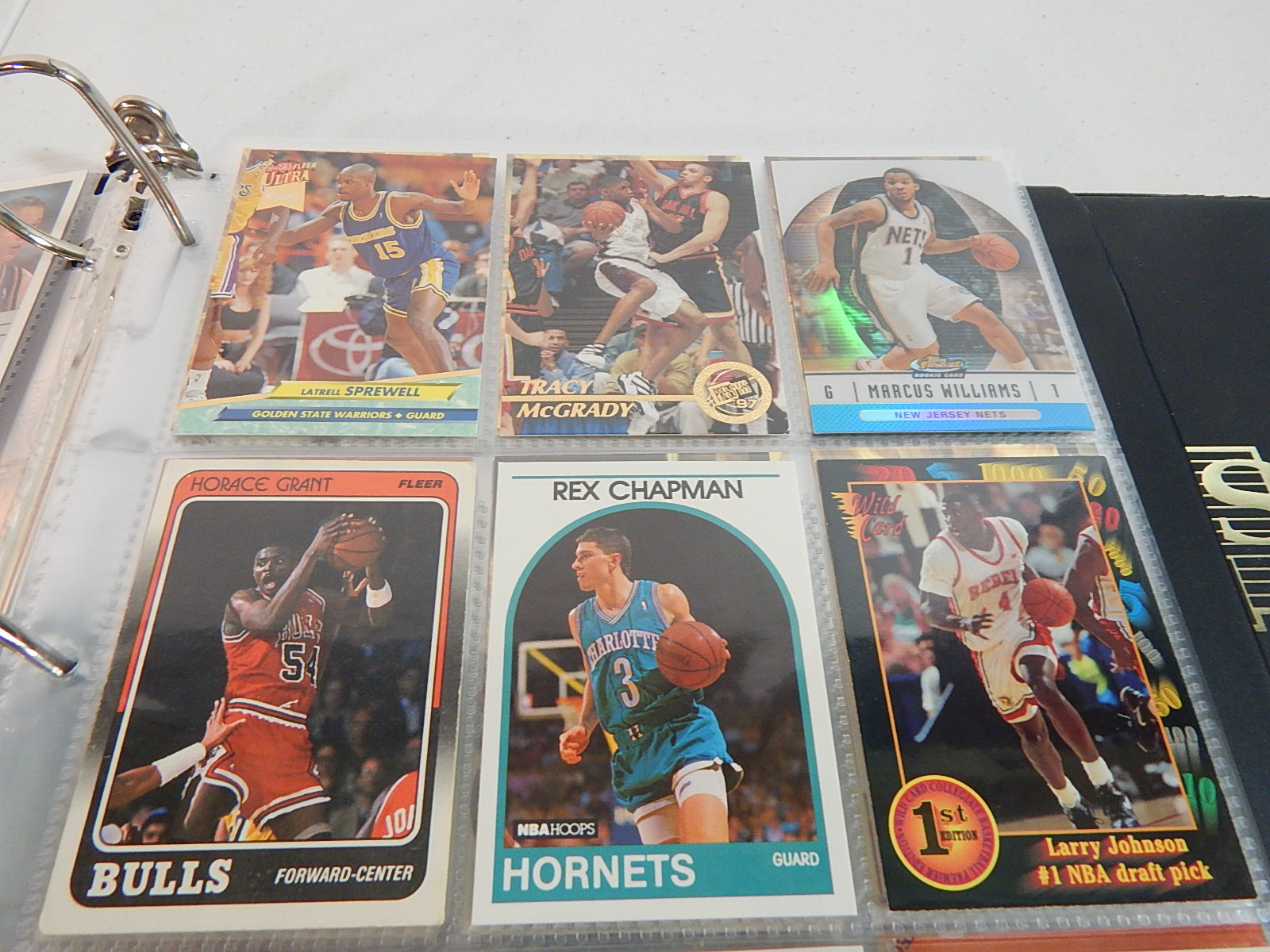 Over 100 Rookie Basketball Cards in Album