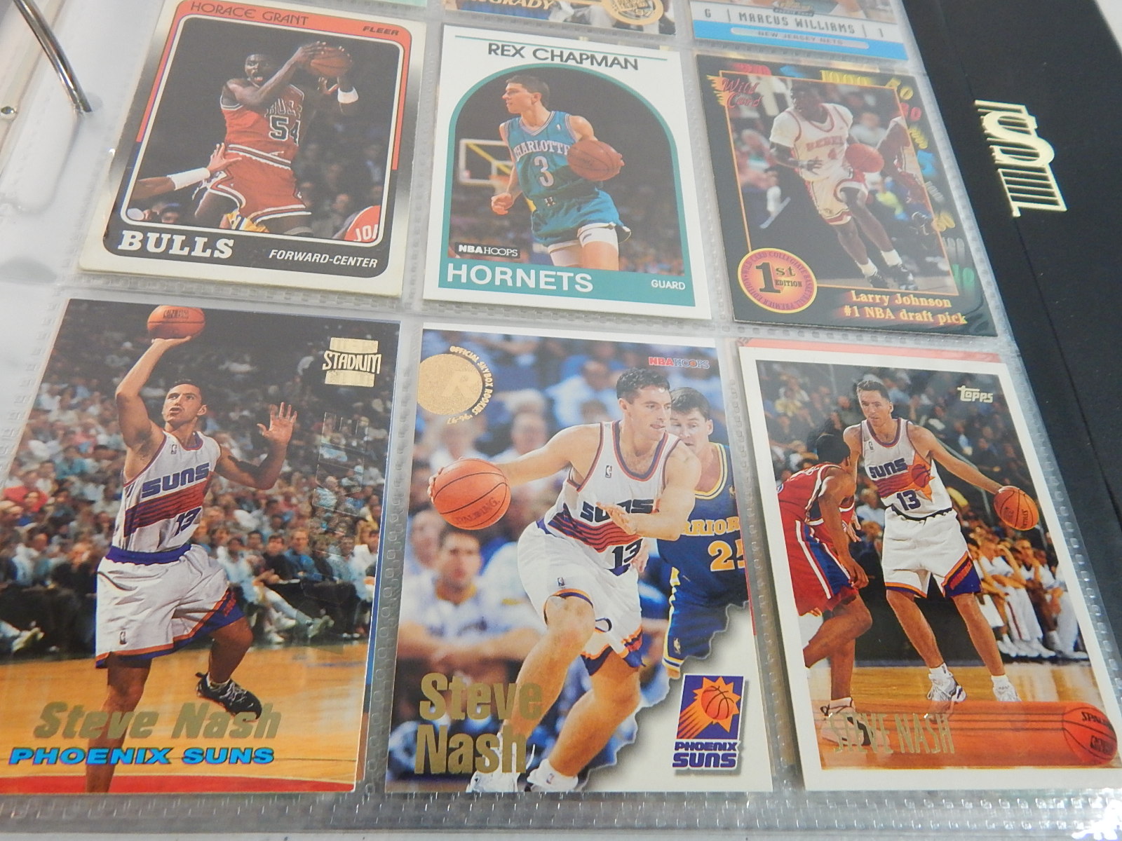 Over 100 Rookie Basketball Cards in Album