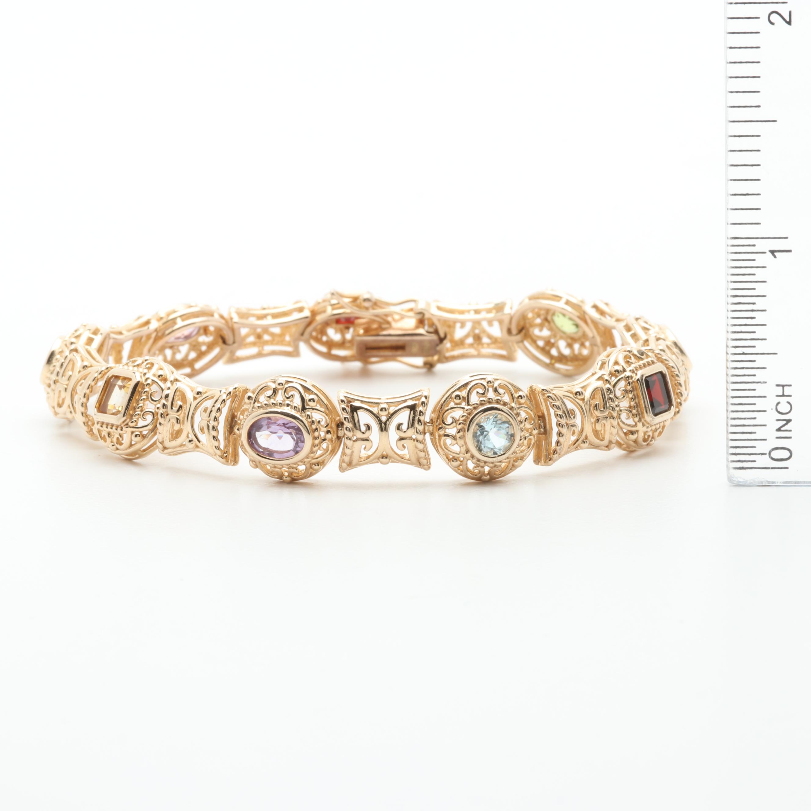 Gold Wash on Sterling Silver Bracelet Featuring Blue Topaz, Garnet and Peridot