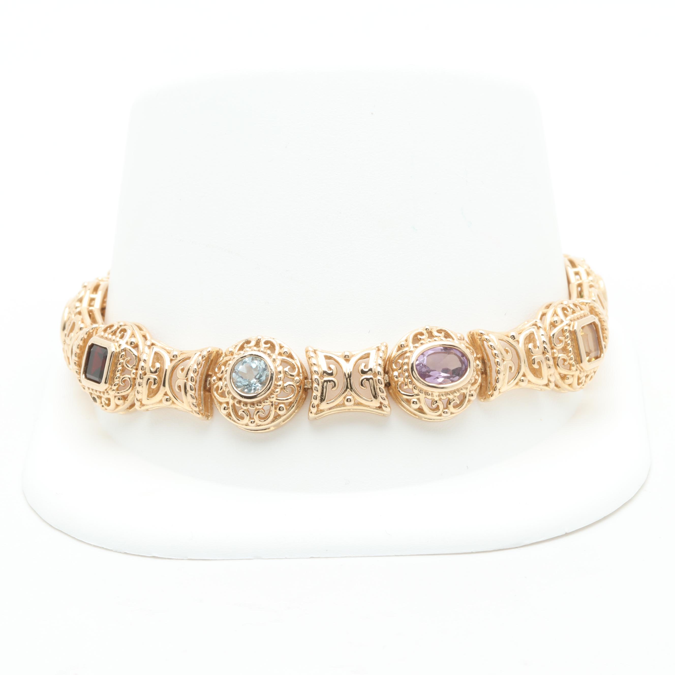 Gold Wash on Sterling Silver Bracelet Featuring Blue Topaz, Garnet and Peridot
