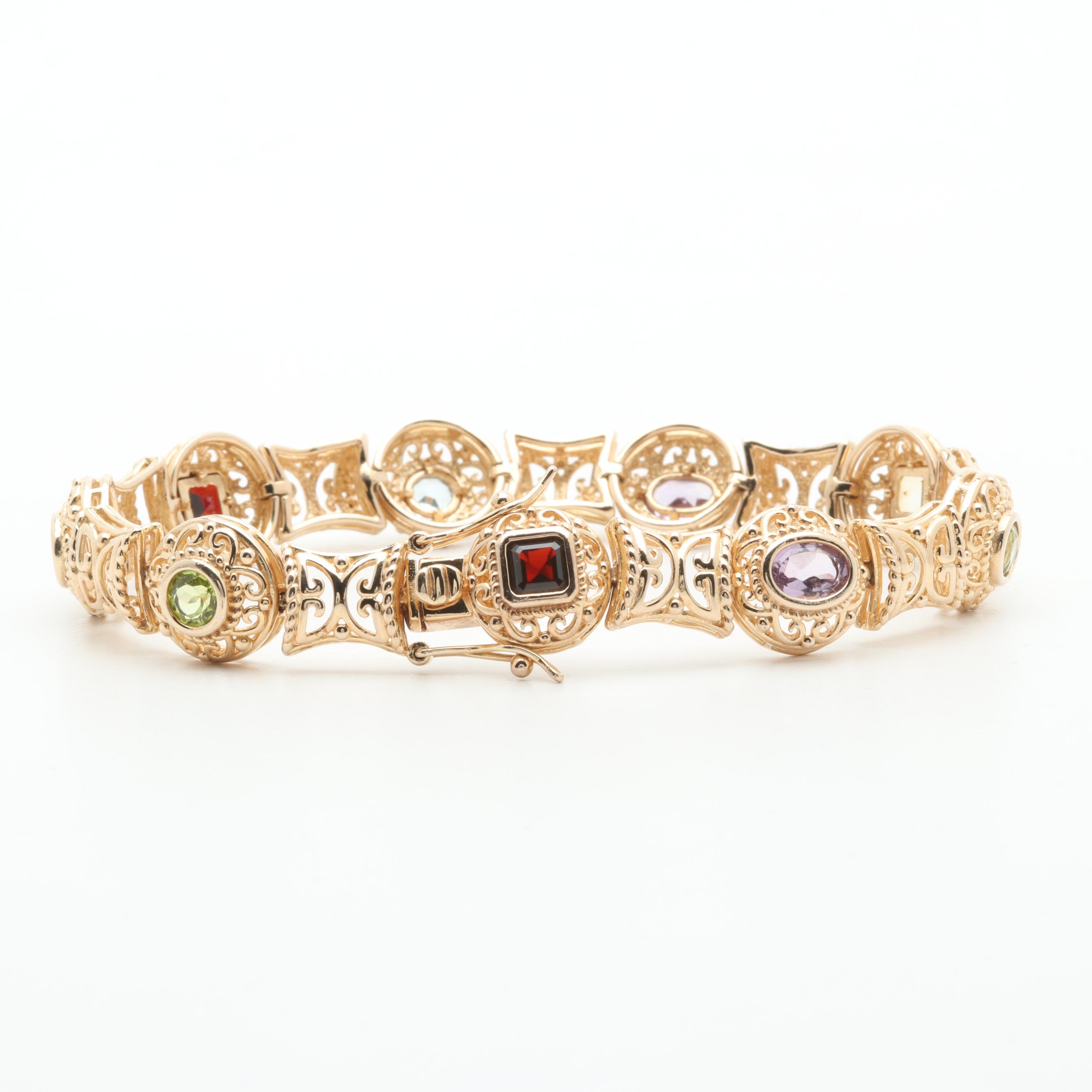 Gold Wash on Sterling Silver Bracelet Featuring Blue Topaz, Garnet and Peridot