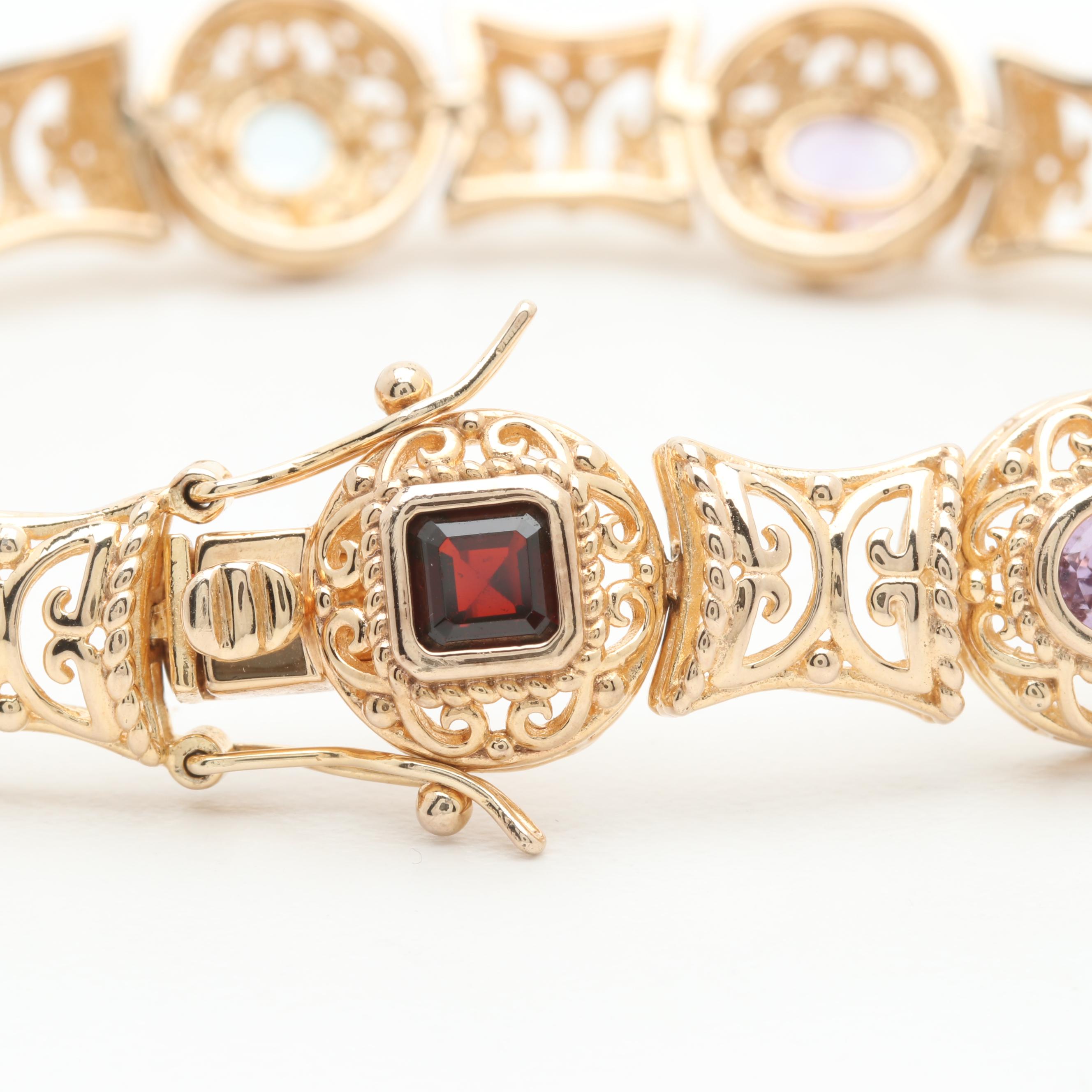 Gold Wash on Sterling Silver Bracelet Featuring Blue Topaz, Garnet and Peridot