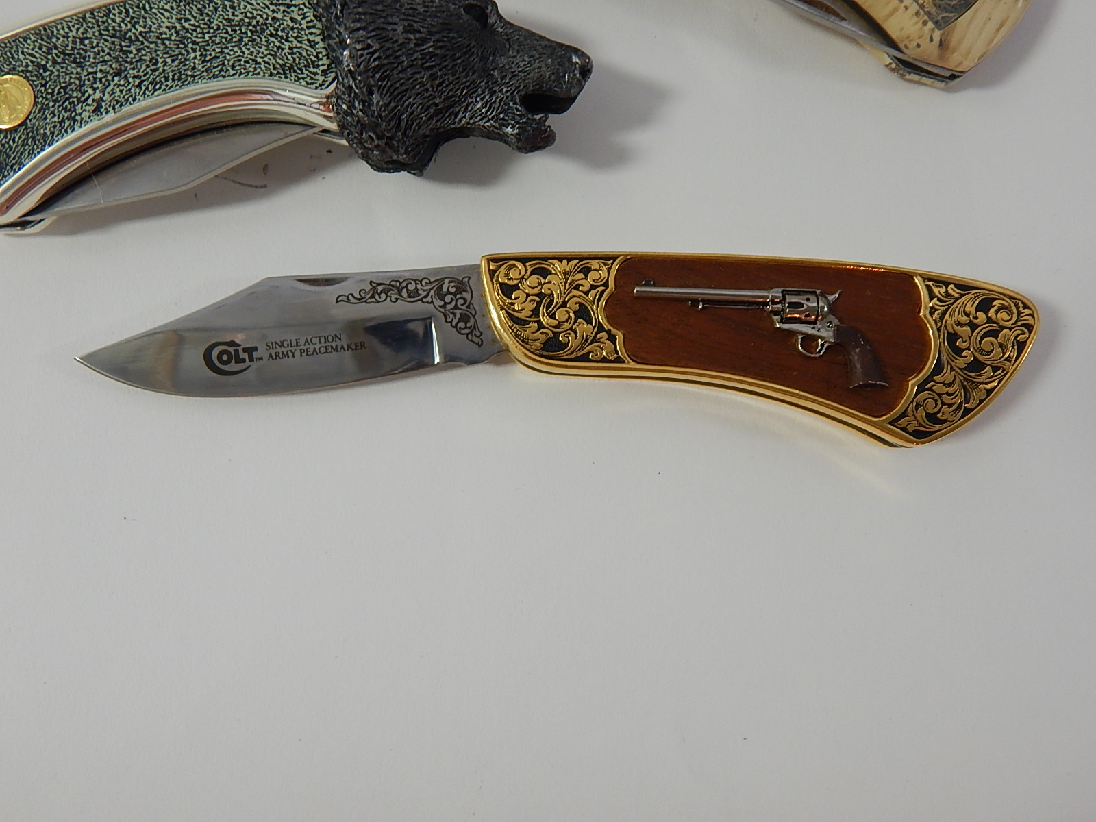 Franklin Mint Collectors Knives with Timber Wolf, Colt Revolver, Moose