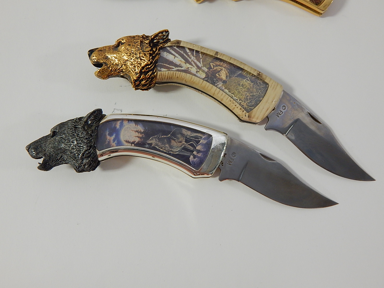 Franklin Mint Collectors Knives with Timber Wolf, Colt Revolver, Moose