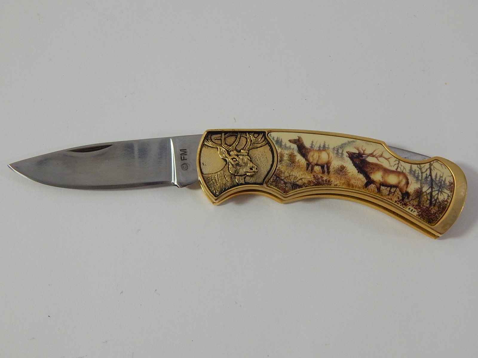 Franklin Mint Collectors Knives with Timber Wolf, Colt Revolver, Moose