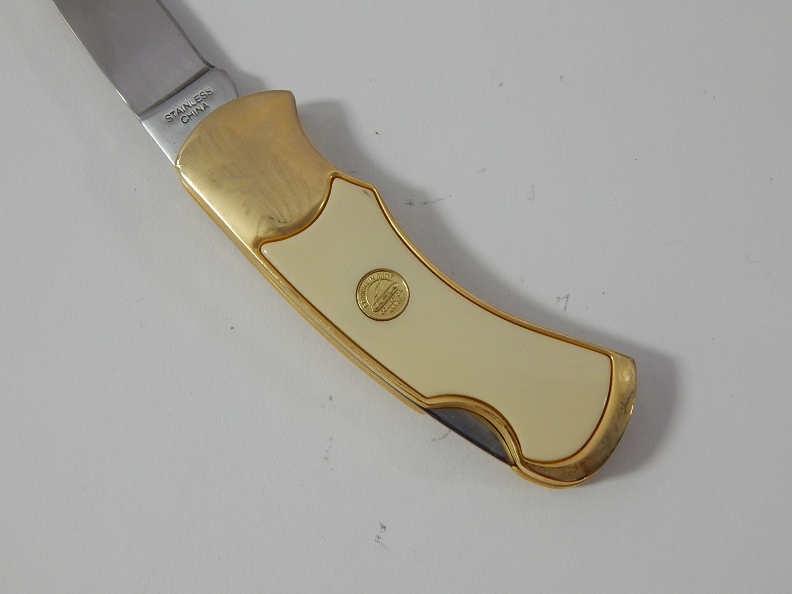 Franklin Mint Collectors Knives with Timber Wolf, Colt Revolver, Moose