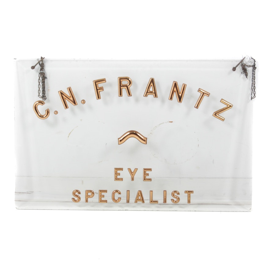 Vintage Retail Hanging Sign "C. N. Frantz Eye Specialist" on Glass