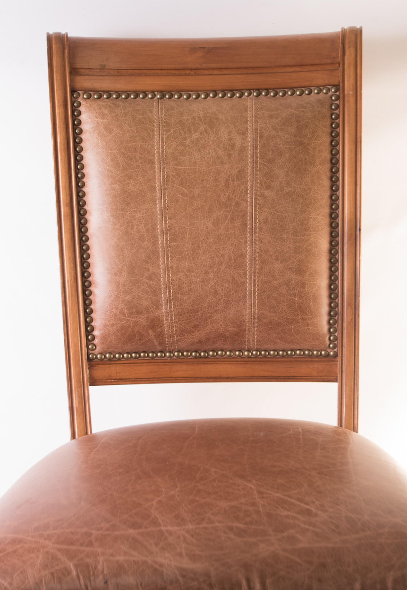 Six Wood and Leather Dining Chairs