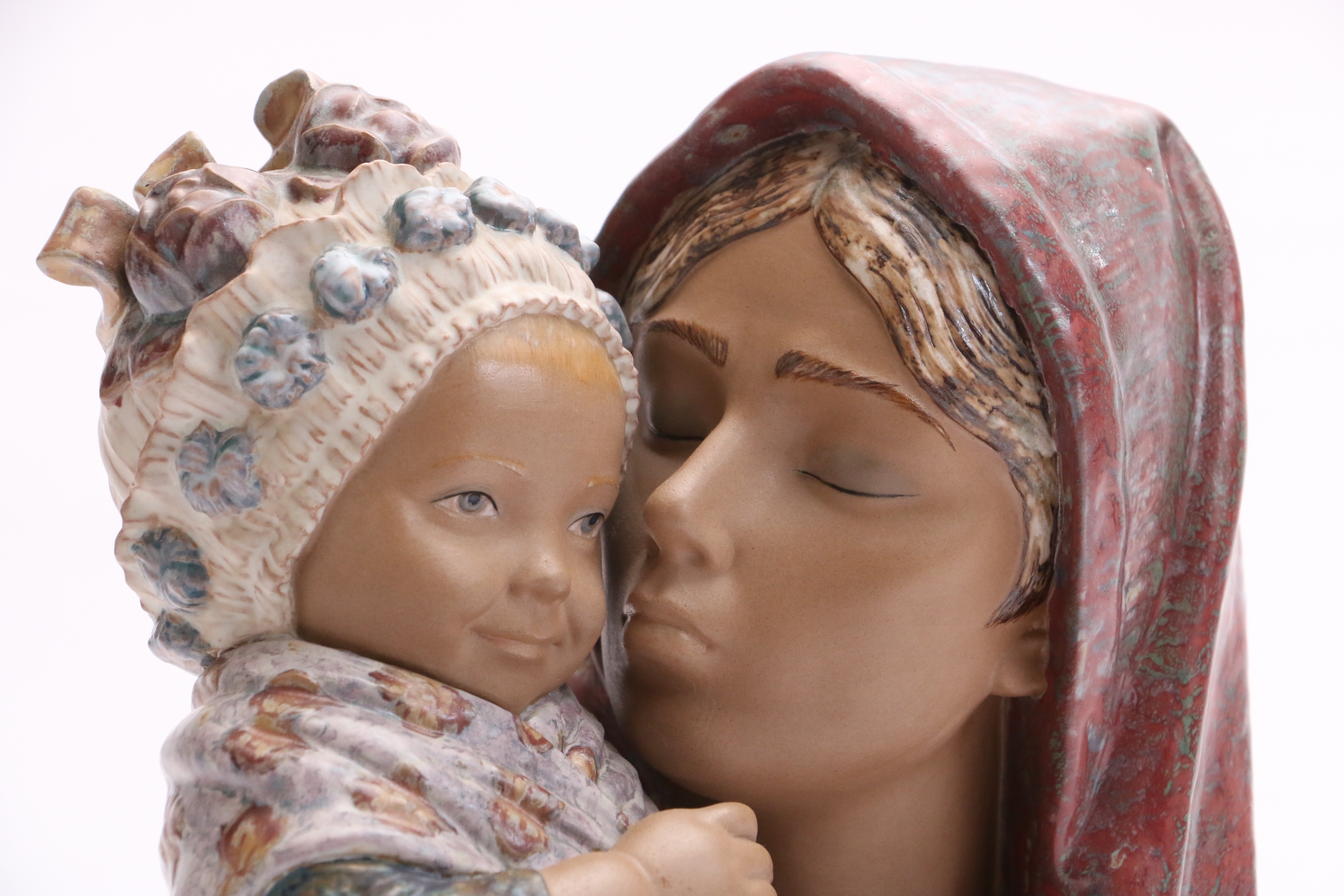 Lladró "Mother Kissing Child" Porcelain Figurine with a Gres Finish