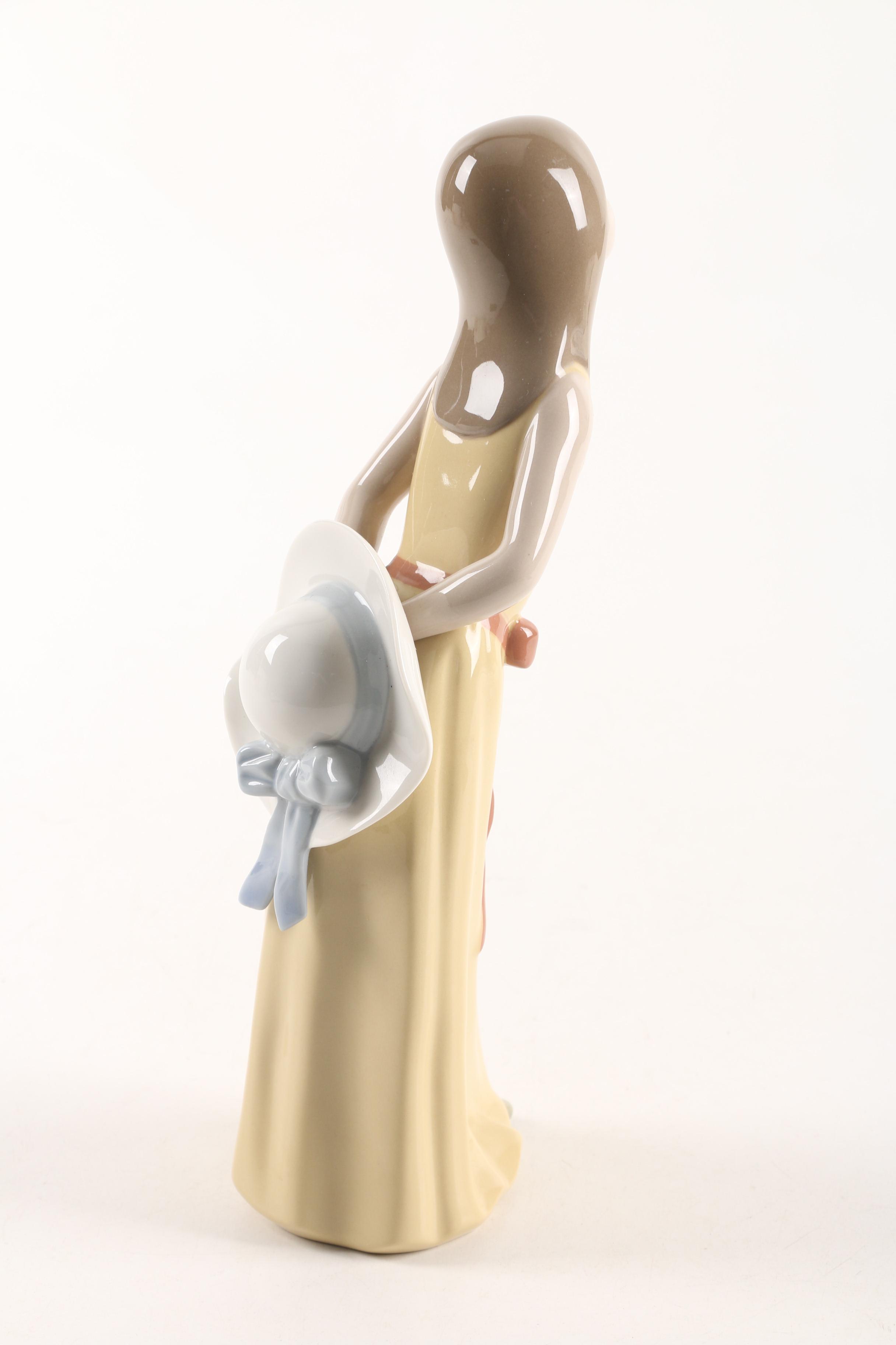 Lladró "Naughty Girl with Straw Hat" Porcelain Figurine