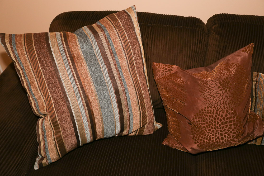 Brown Upholstered Sofa with Ottoman