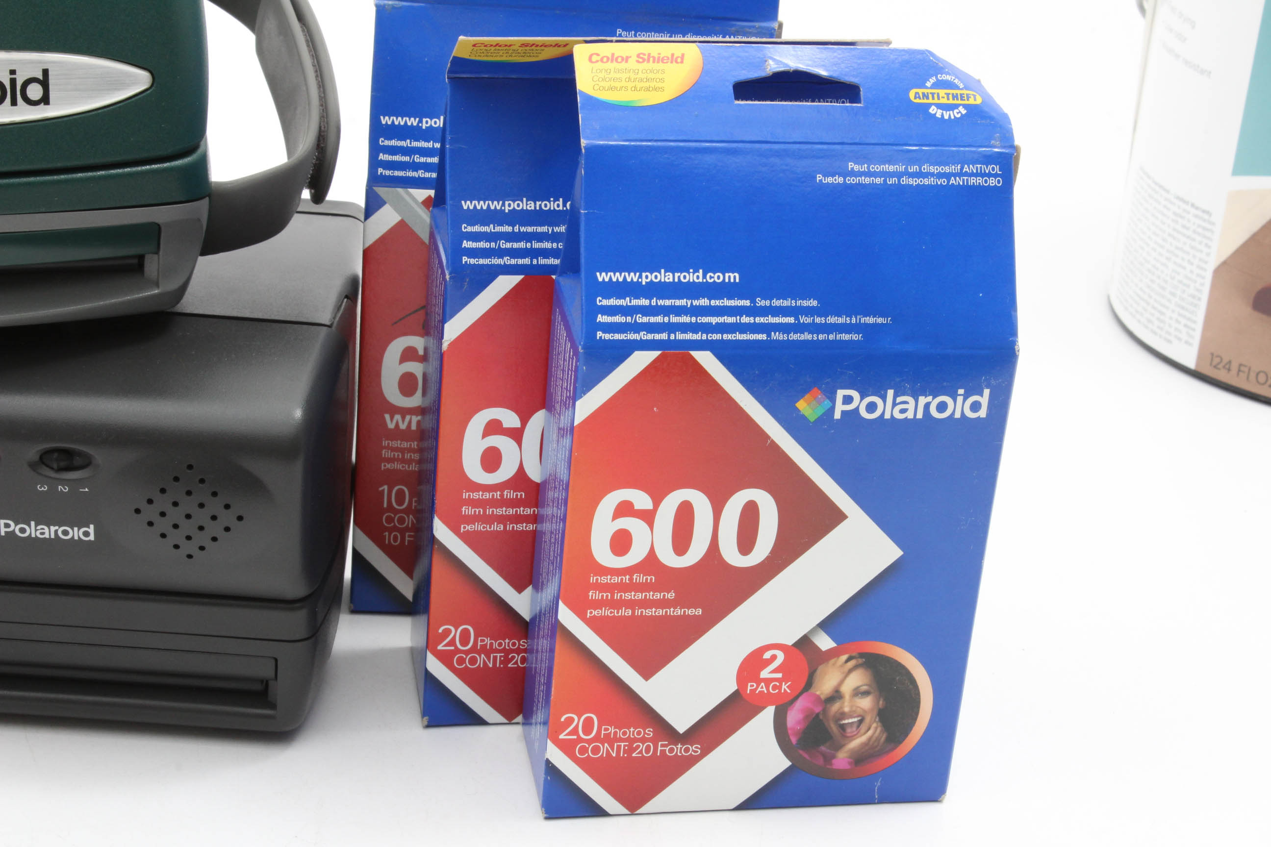 Three Polaroid Instant Film Cameras and Film