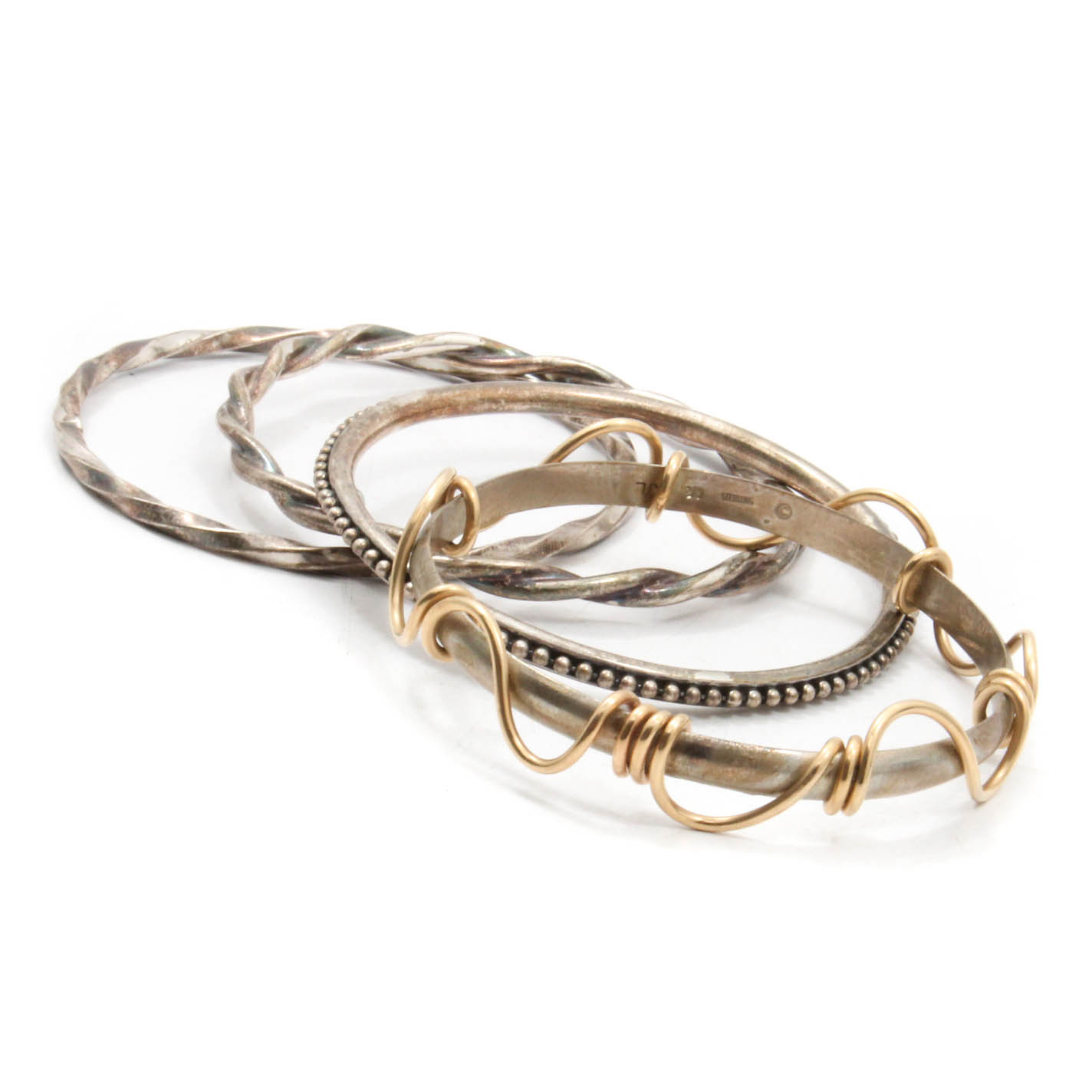 Four Sterling Silver Bangle Bracelets