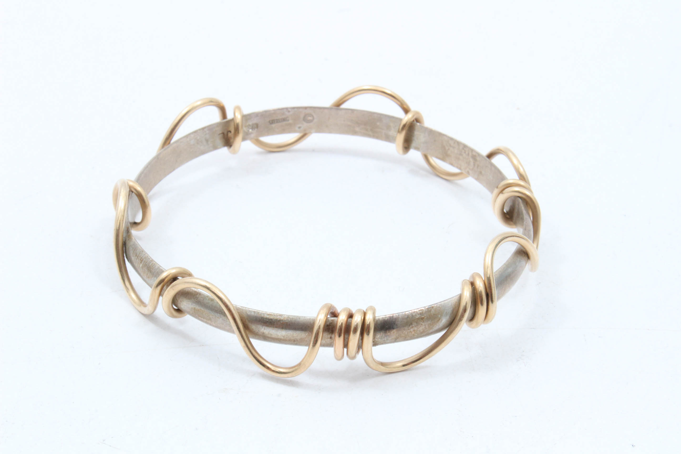 Four Sterling Silver Bangle Bracelets