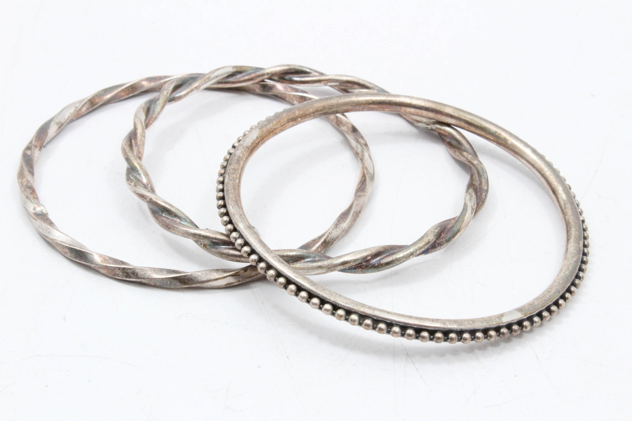 Four Sterling Silver Bangle Bracelets
