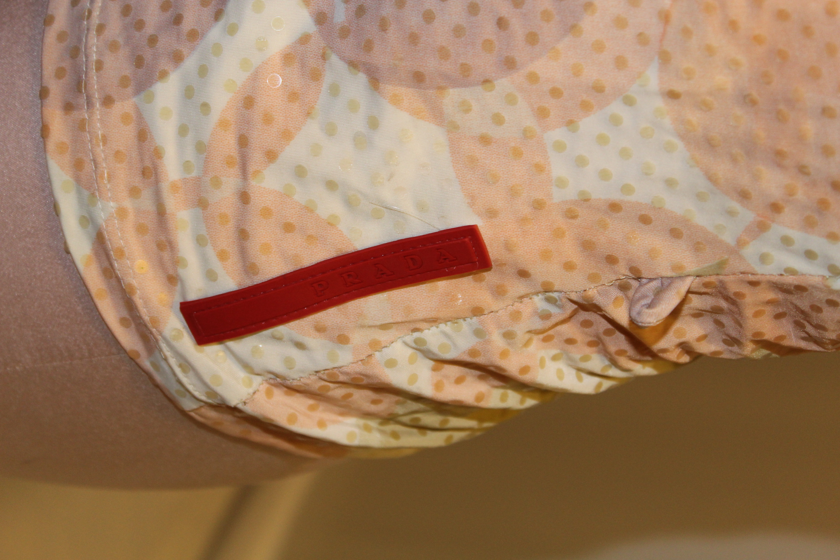 Women's Designer Shirts Featuring Prada, Fendi and Dolce & Gabbana