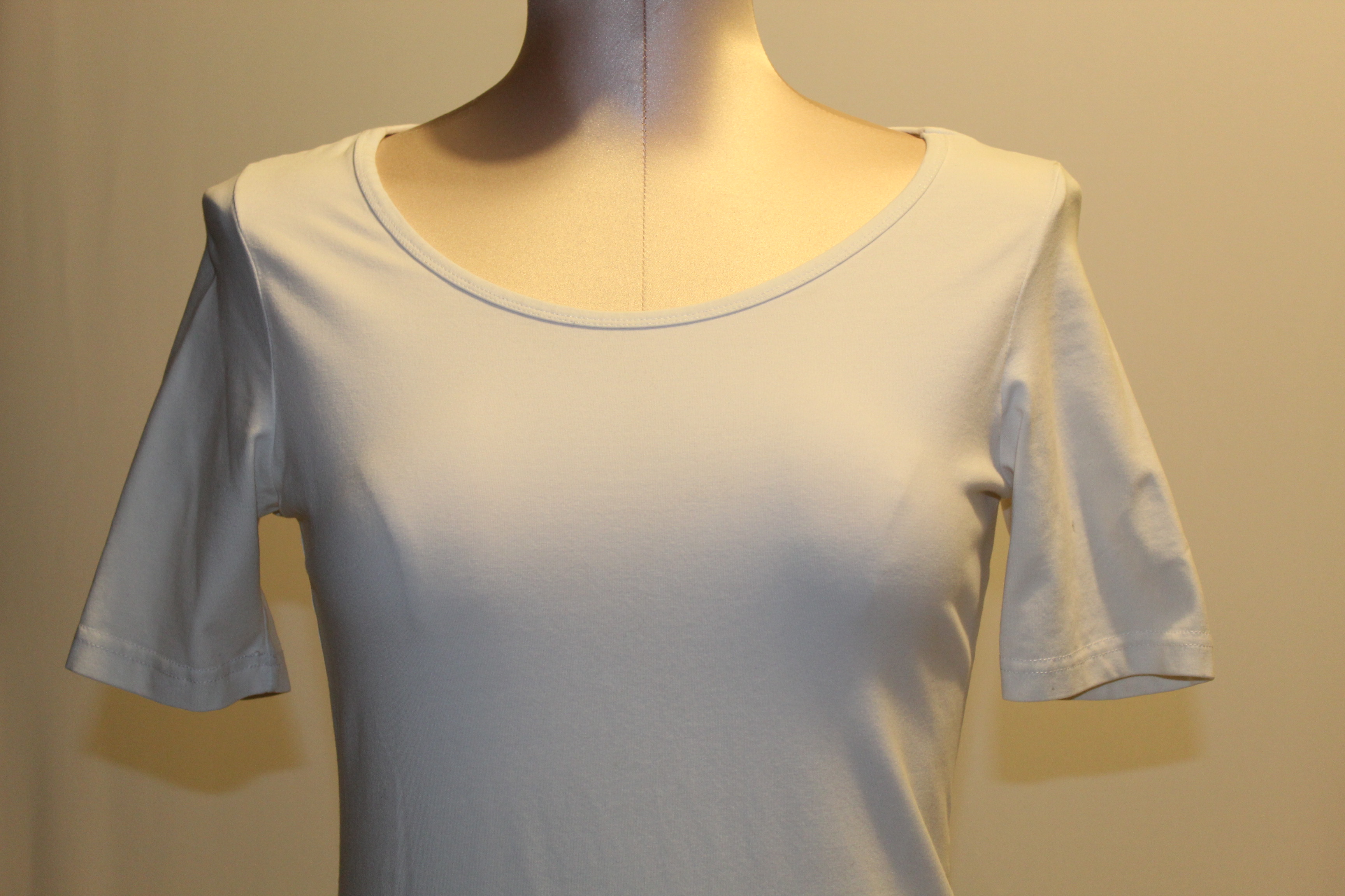 Women's Designer Shirts Featuring Prada, Fendi and Dolce & Gabbana