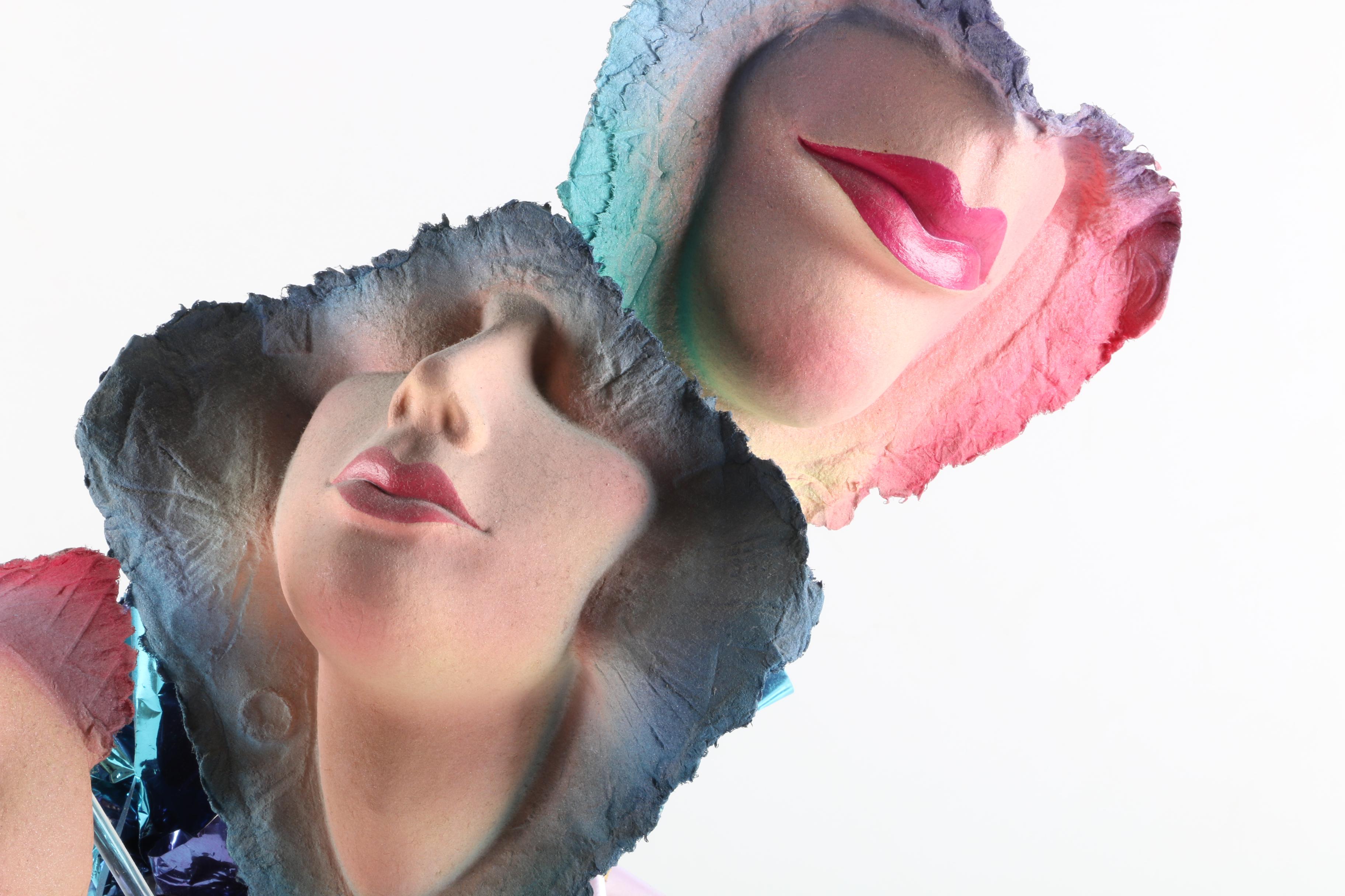 Handmade Paper Relief Sculptures of Faces in Vase