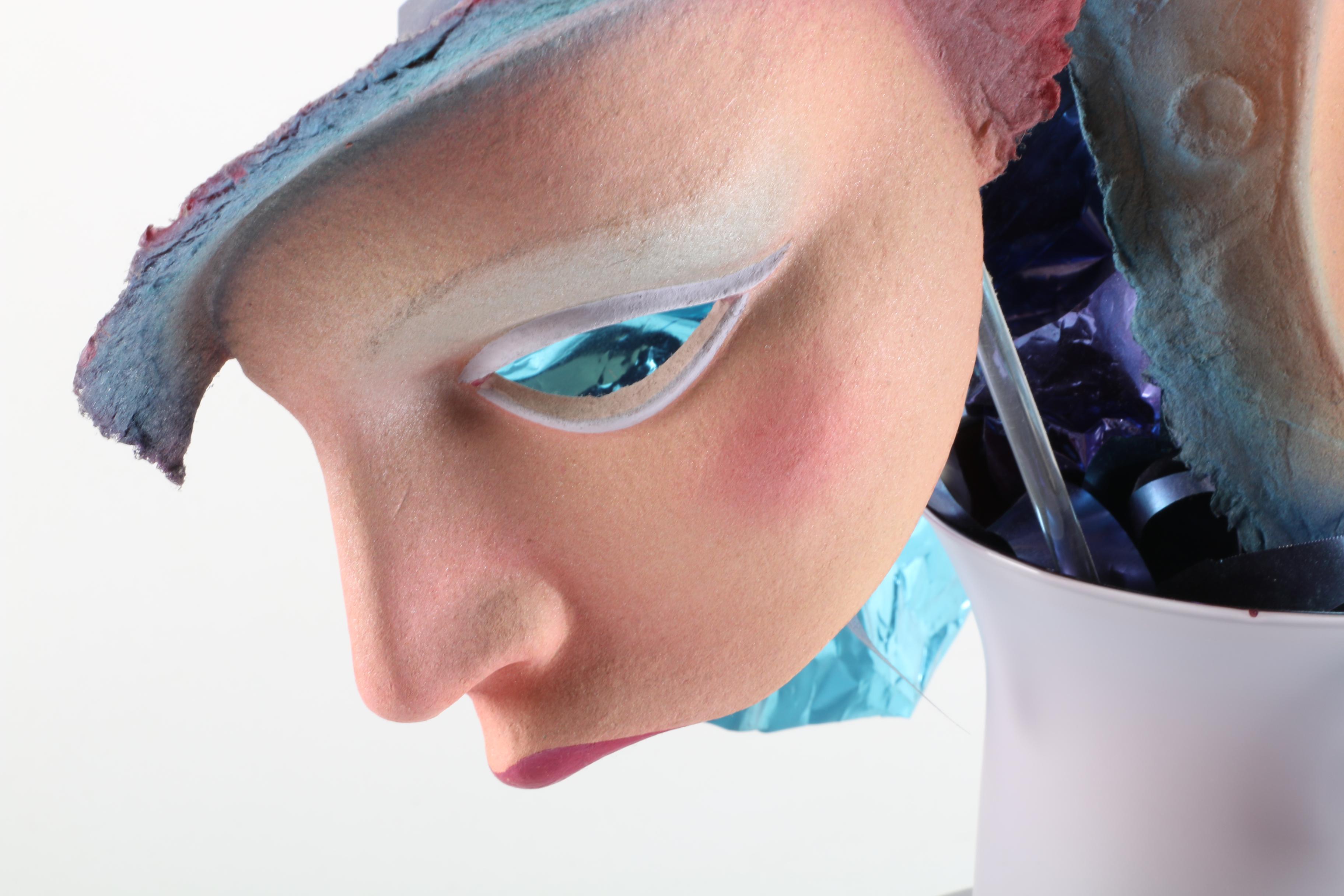 Handmade Paper Relief Sculptures of Faces in Vase