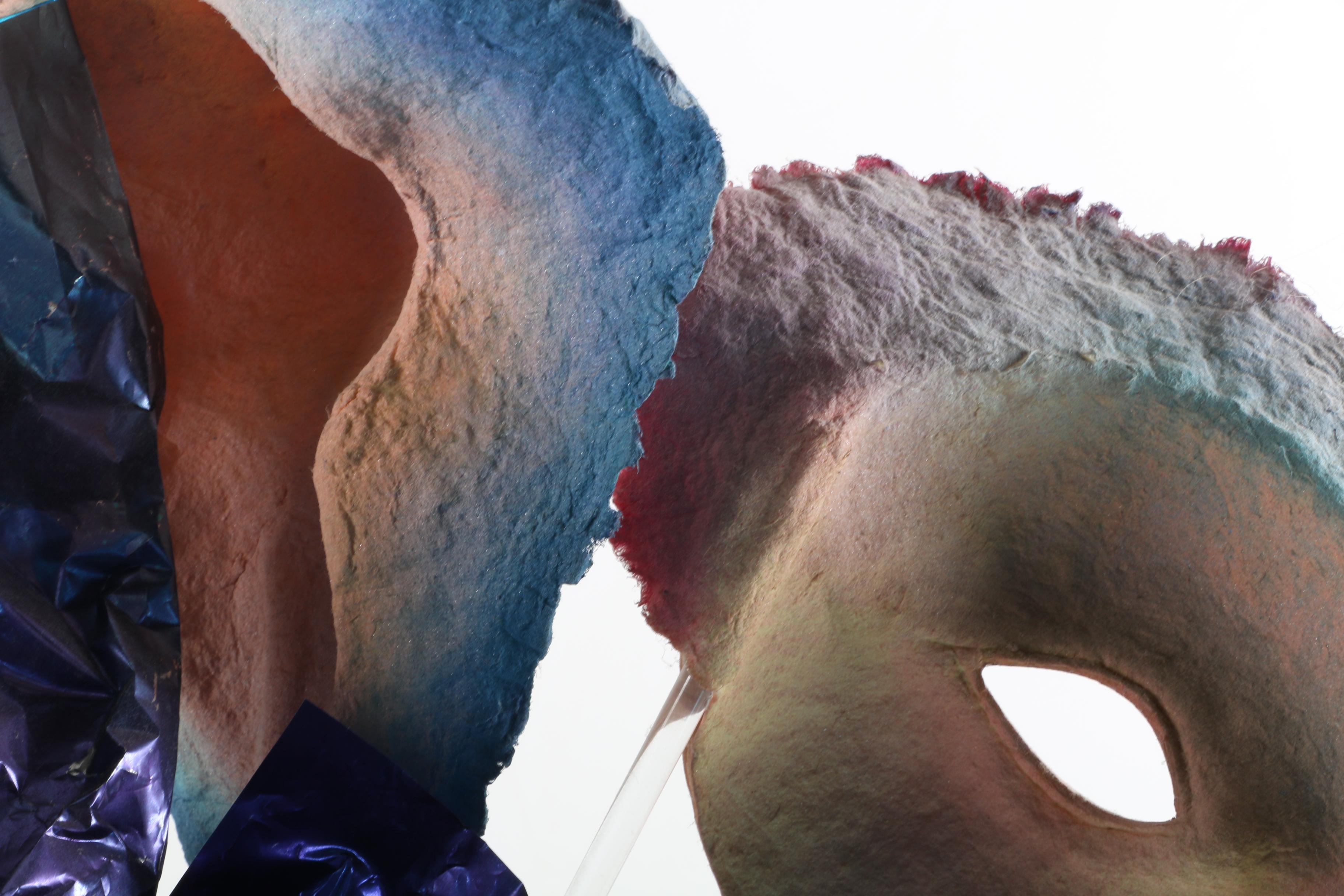 Handmade Paper Relief Sculptures of Faces in Vase