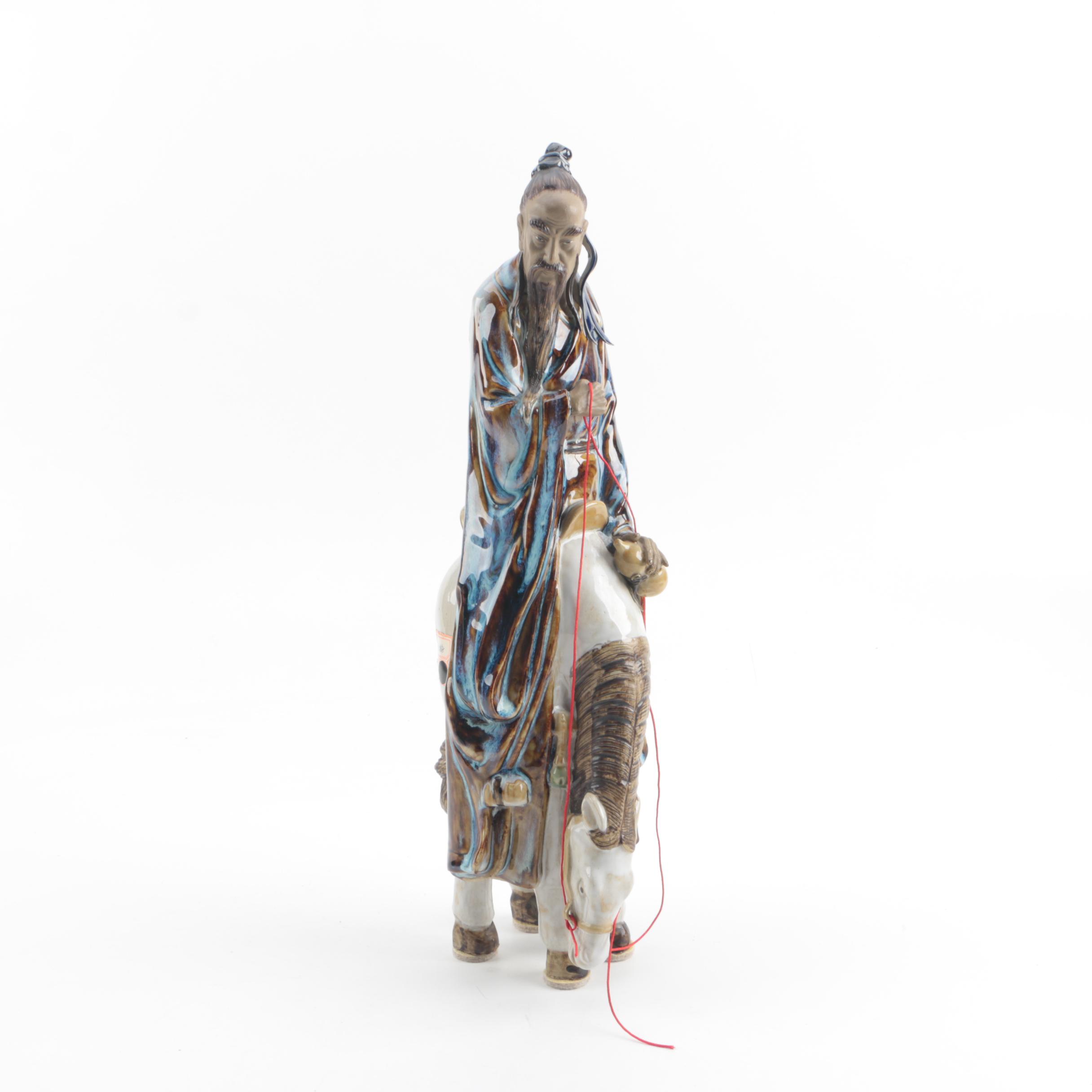 Chinese Ceramic Figurine of Man on Horseback