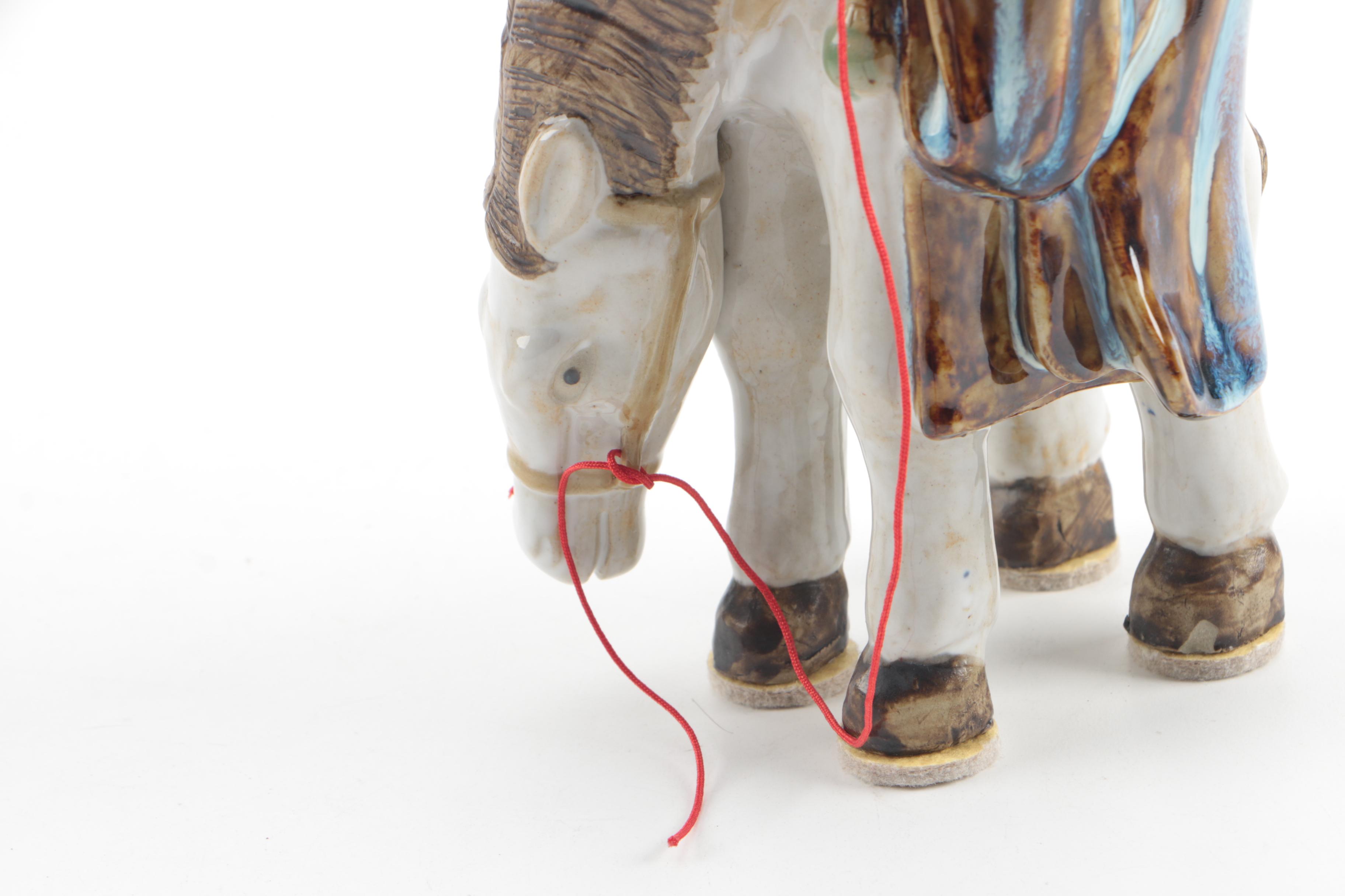 Chinese Ceramic Figurine of Man on Horseback