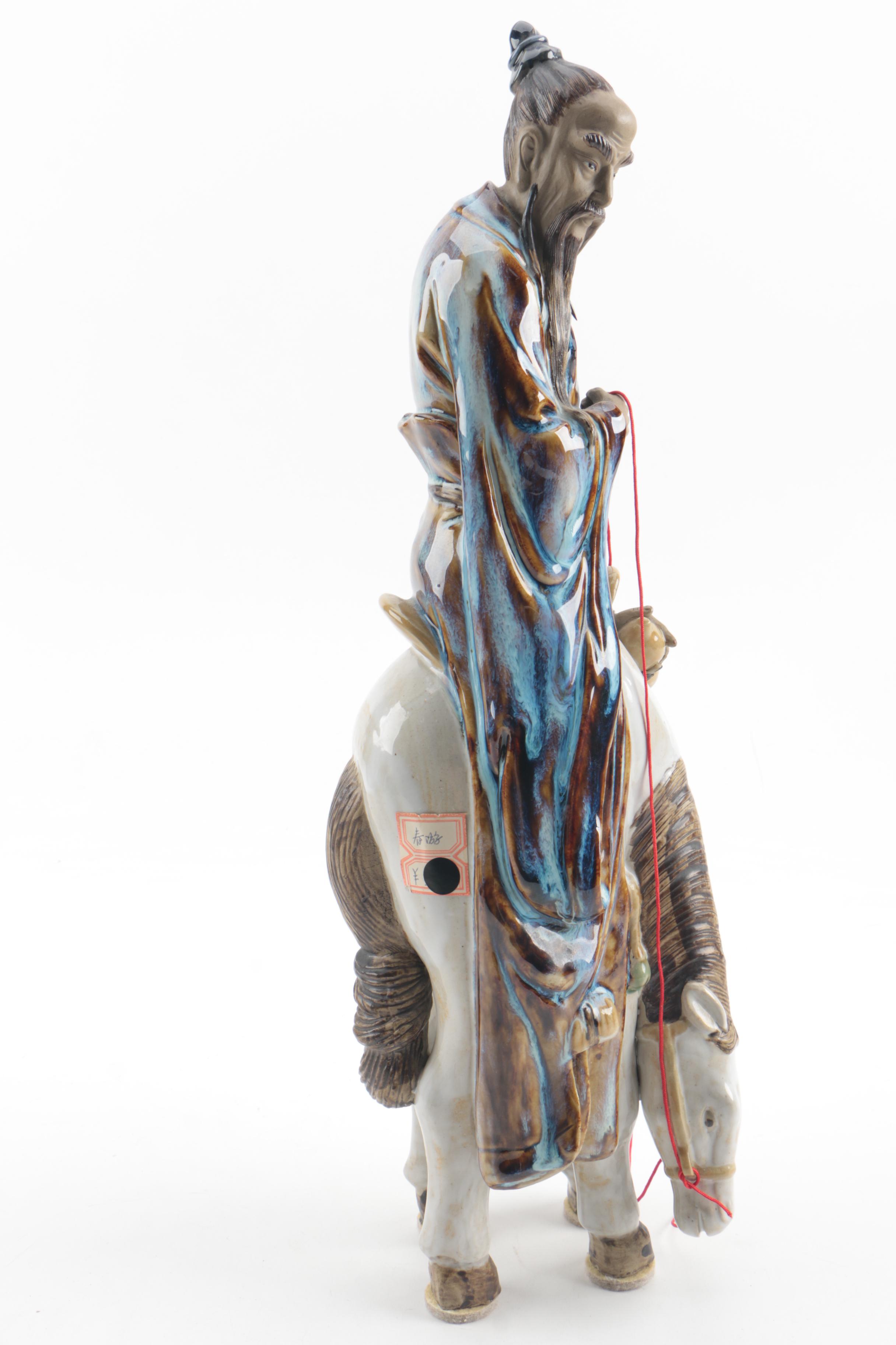 Chinese Ceramic Figurine of Man on Horseback