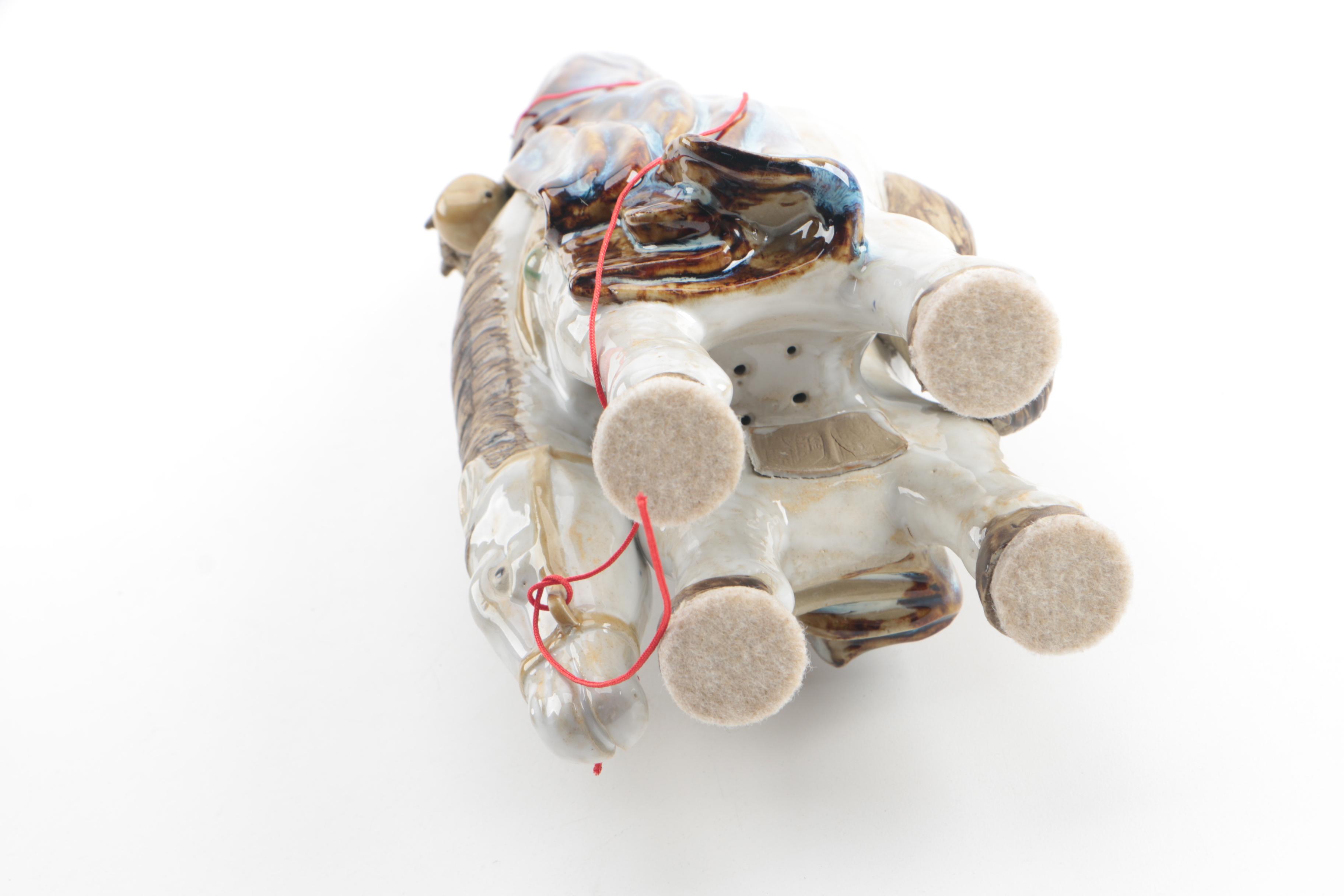 Chinese Ceramic Figurine of Man on Horseback