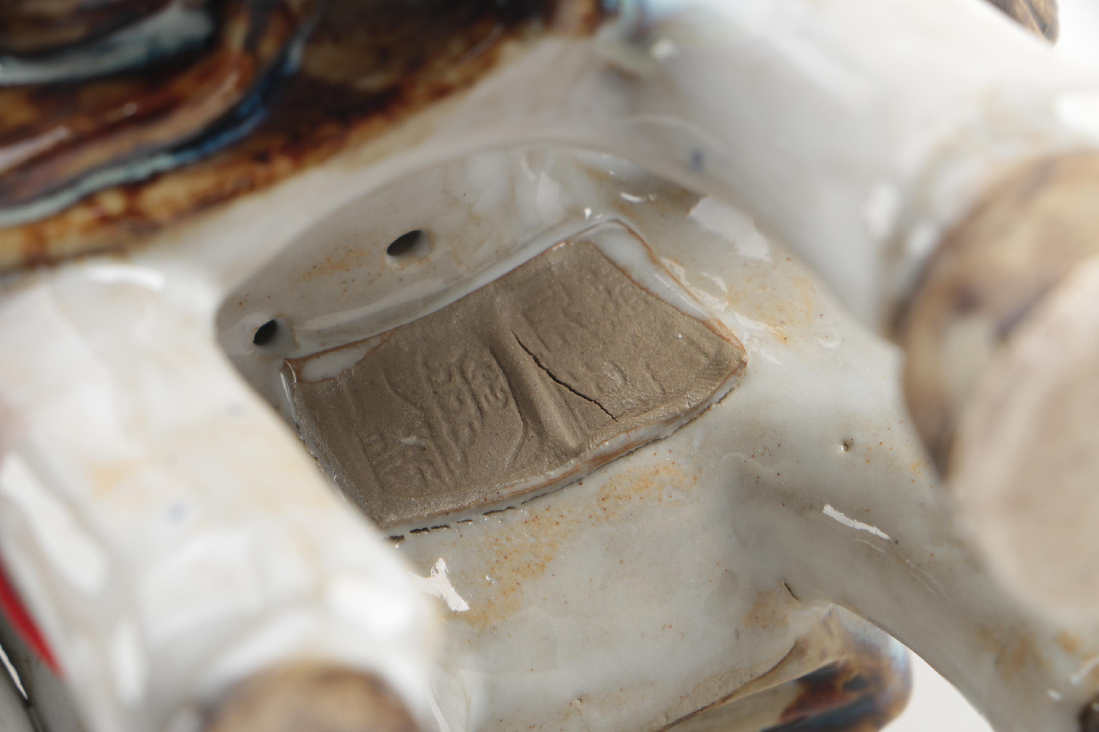 Chinese Ceramic Figurine of Man on Horseback