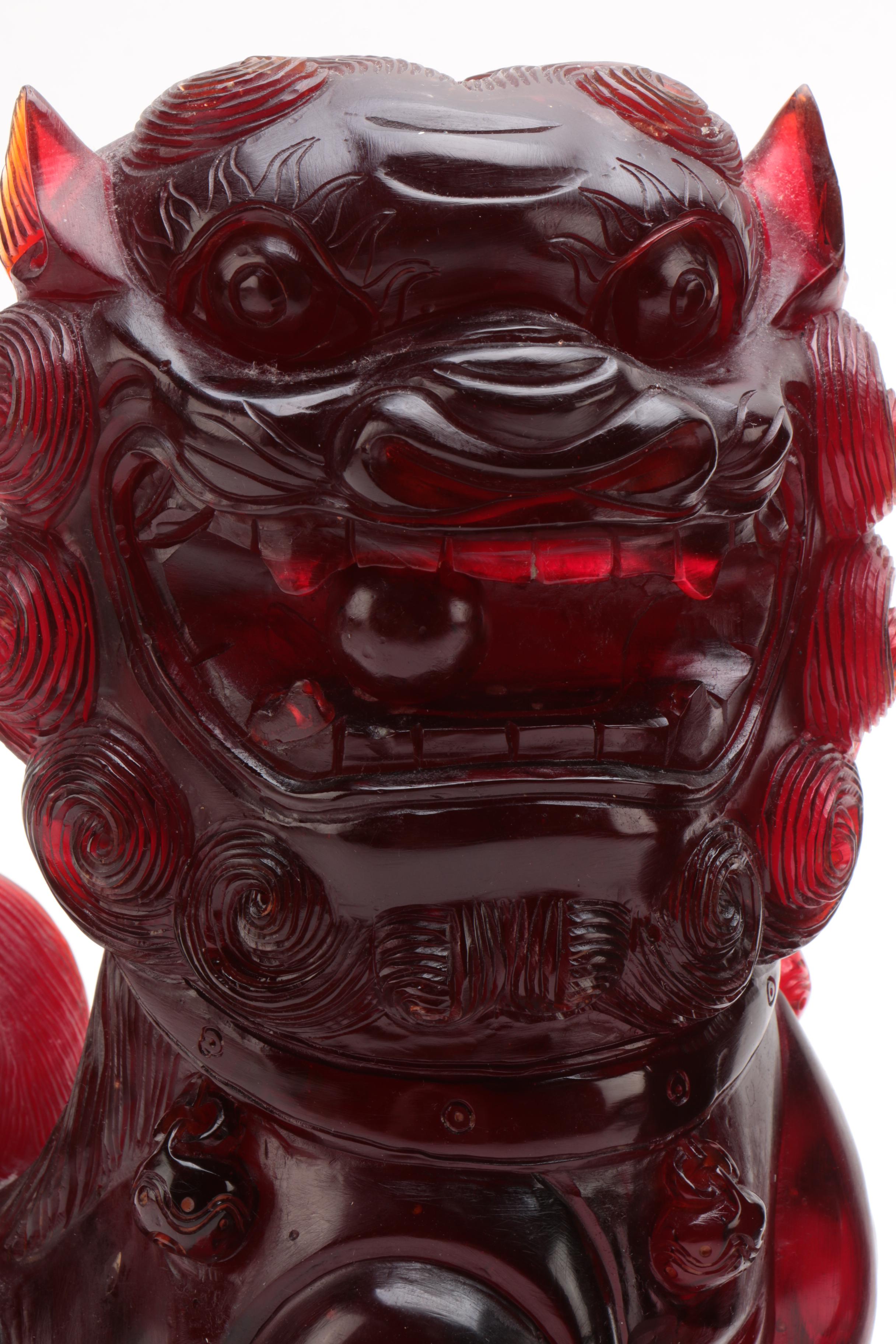 Chinese Translucent Red Resin Guardian Lion Figures
