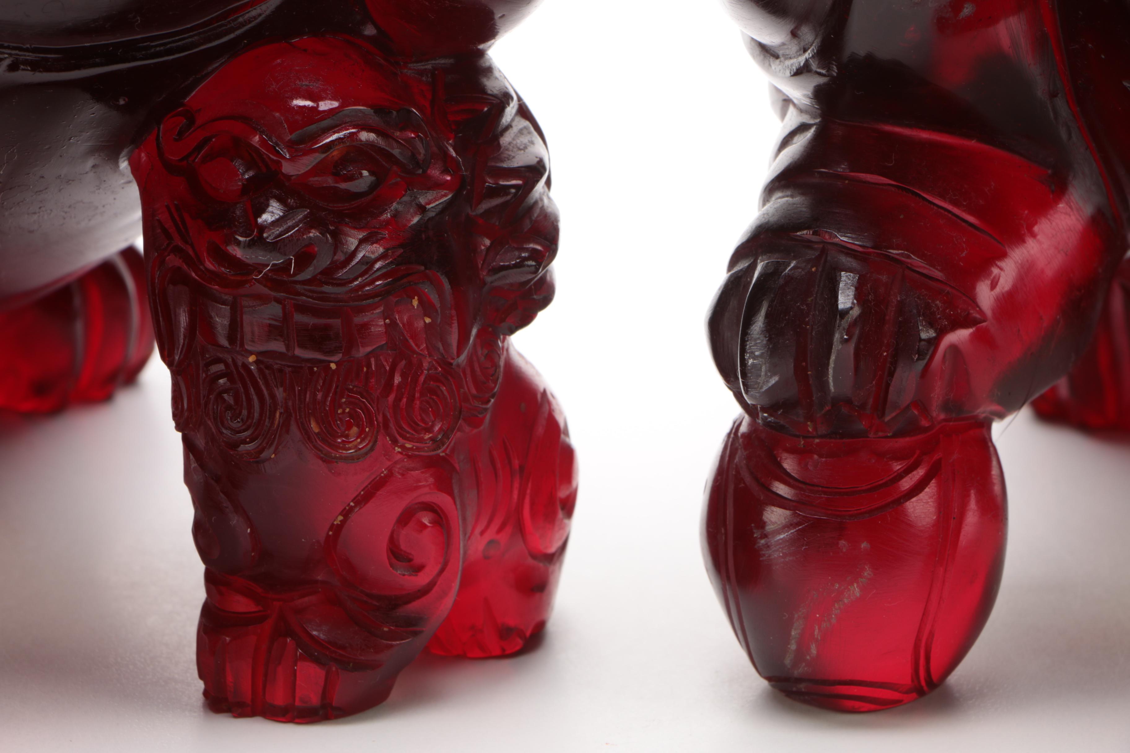 Chinese Translucent Red Resin Guardian Lion Figures