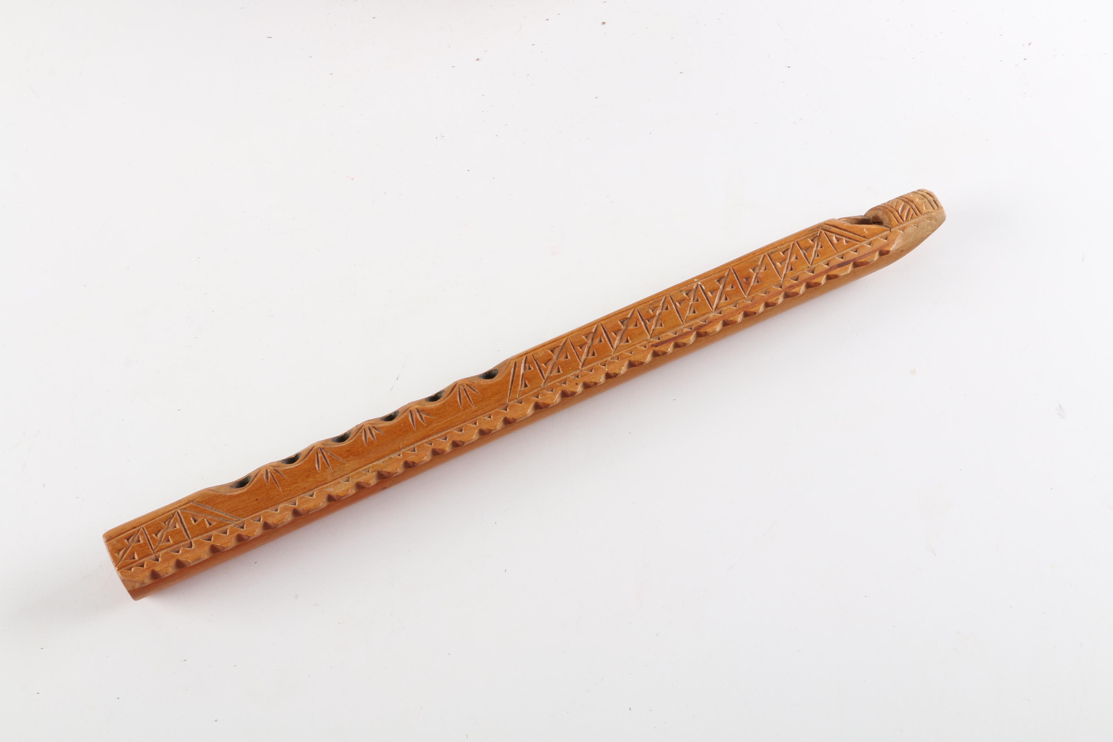 Percussion Instruments and Carved Wooden Woodwind Insturment