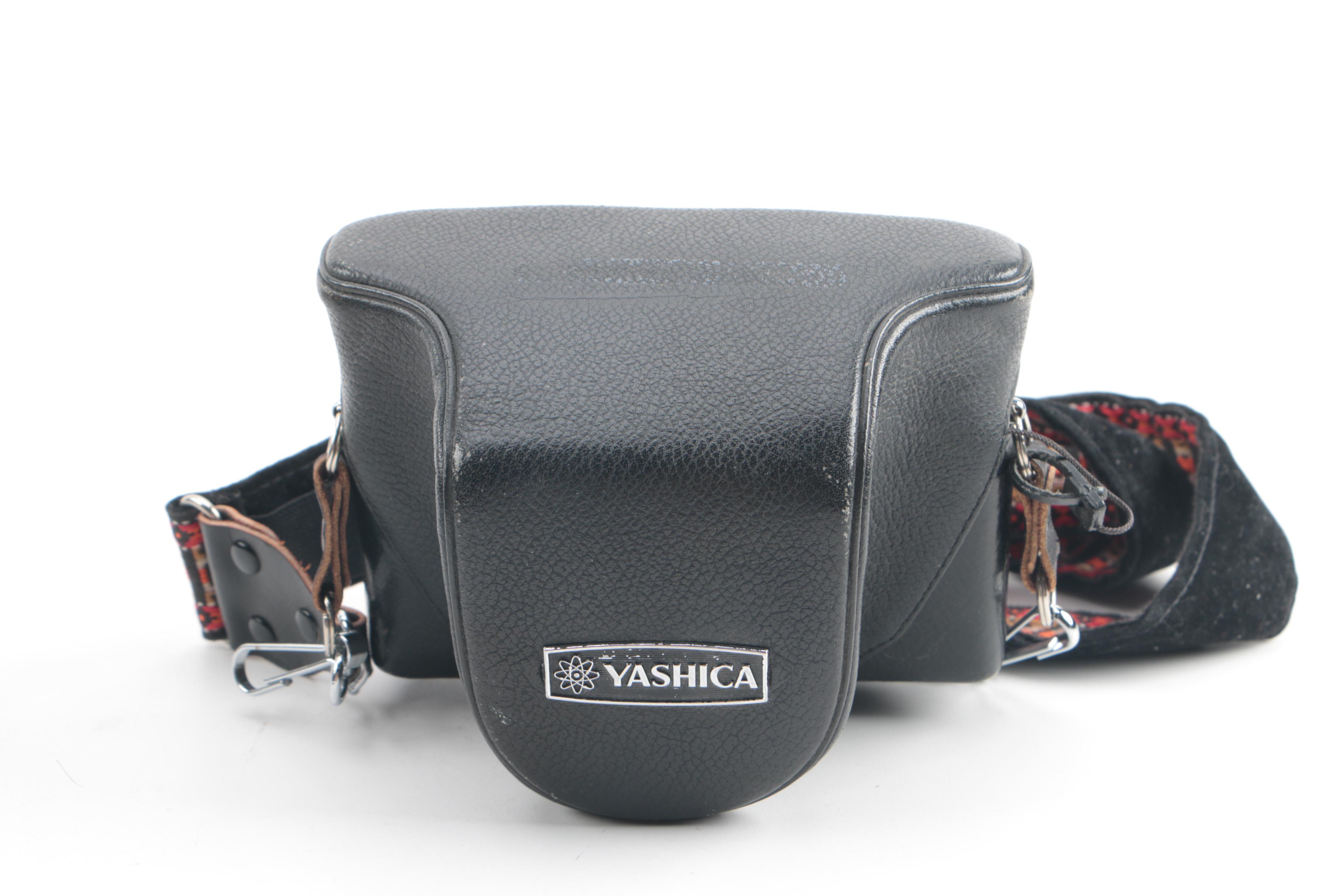 Vintage Yashica Electro 35 and FX-D Quartz Cameras with Cases and Accessories