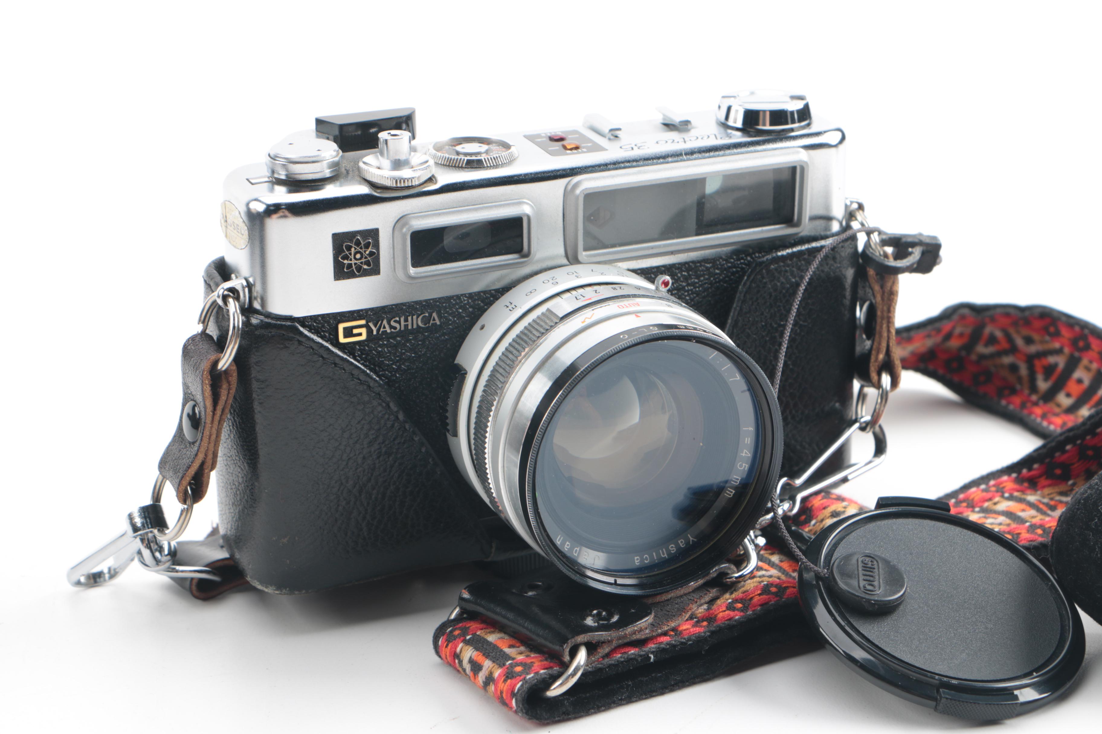 Vintage Yashica Electro 35 and FX-D Quartz Cameras with Cases and Accessories