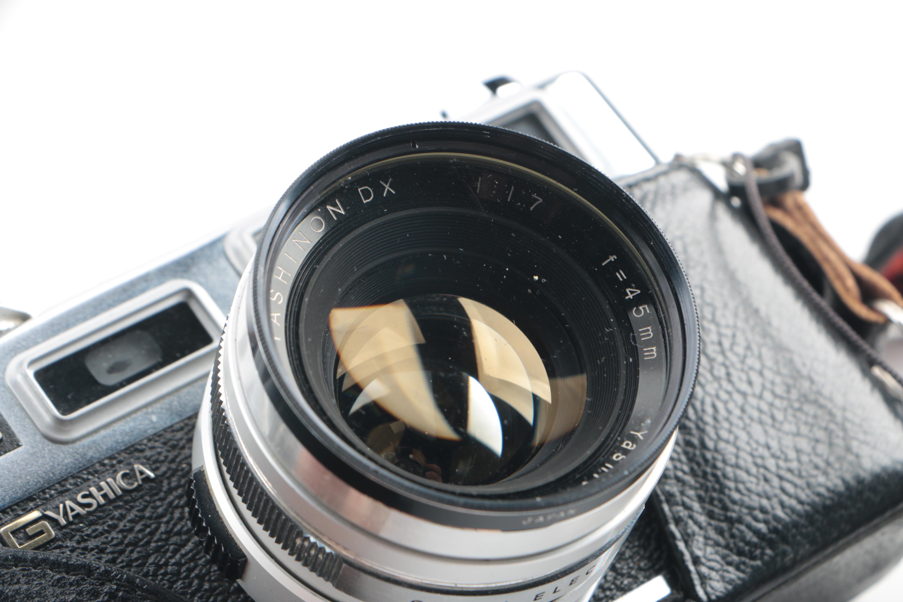 Vintage Yashica Electro 35 and FX-D Quartz Cameras with Cases and Accessories