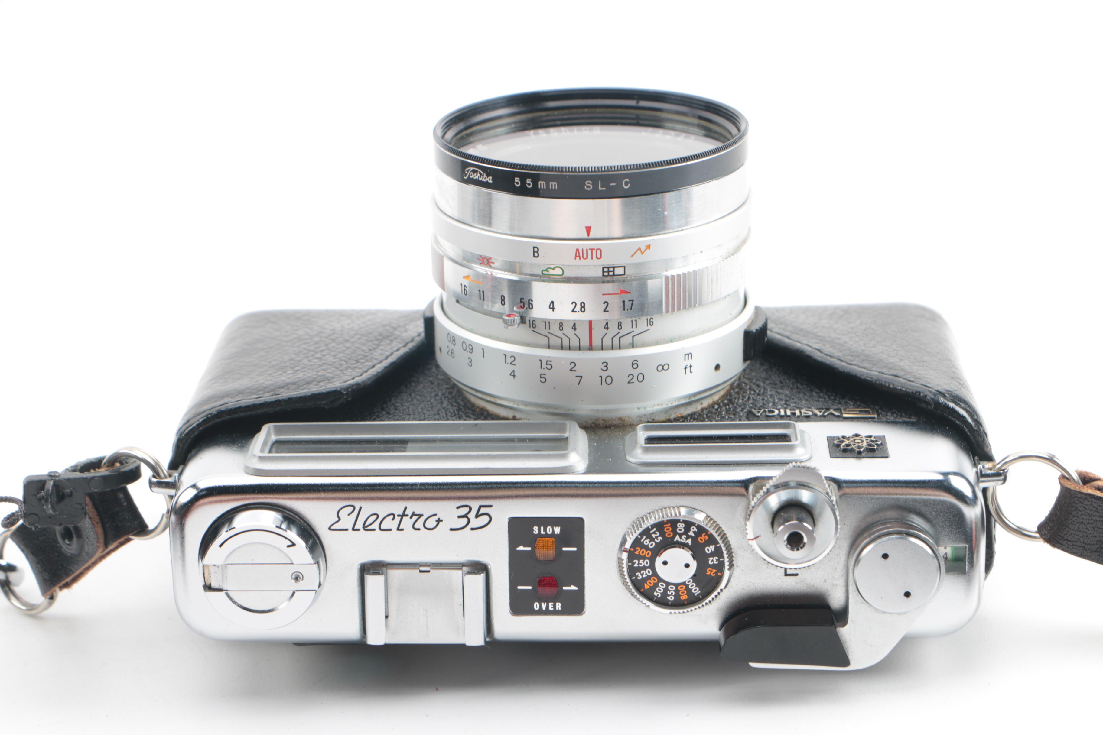 Vintage Yashica Electro 35 and FX-D Quartz Cameras with Cases and Accessories