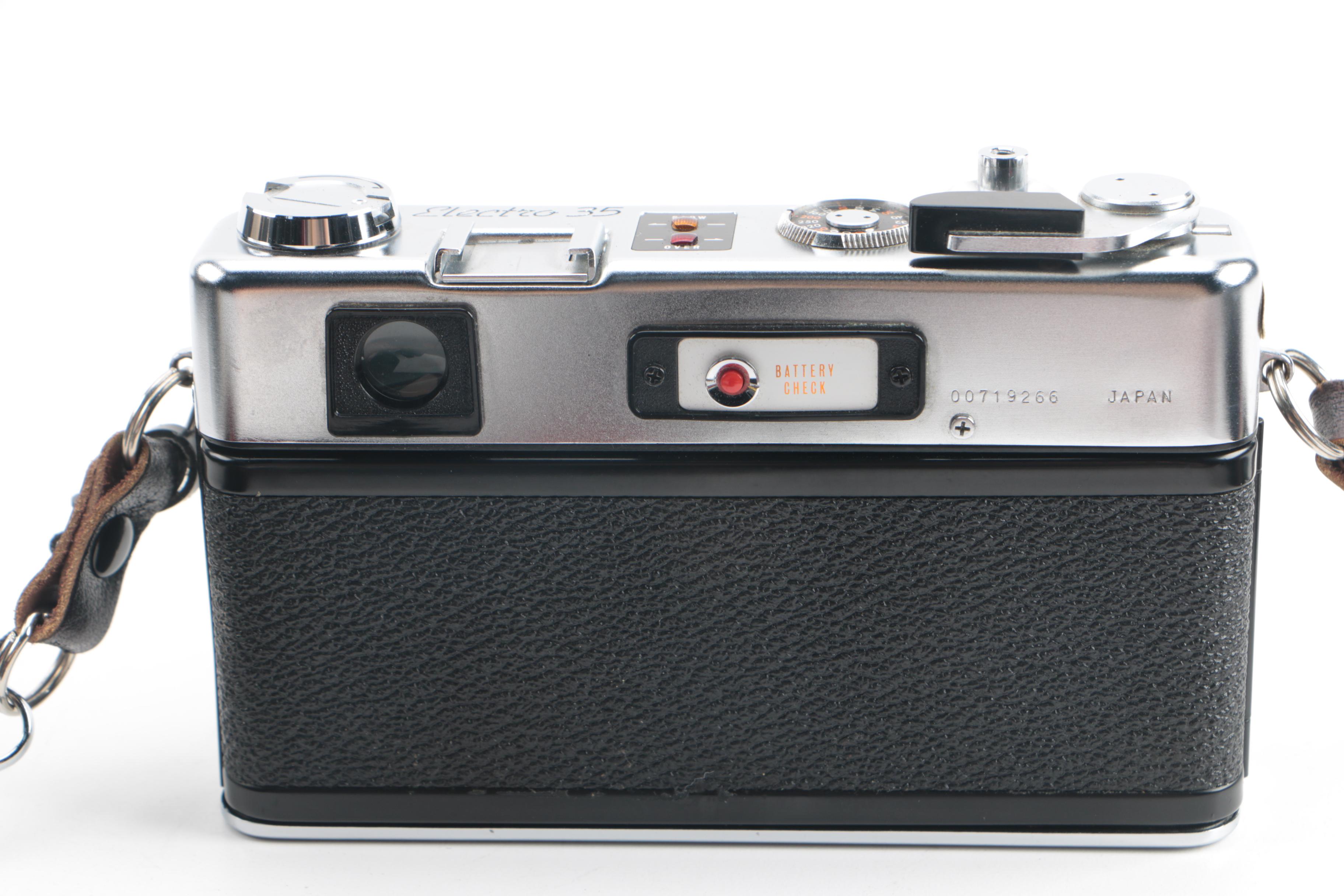 Vintage Yashica Electro 35 and FX-D Quartz Cameras with Cases and Accessories