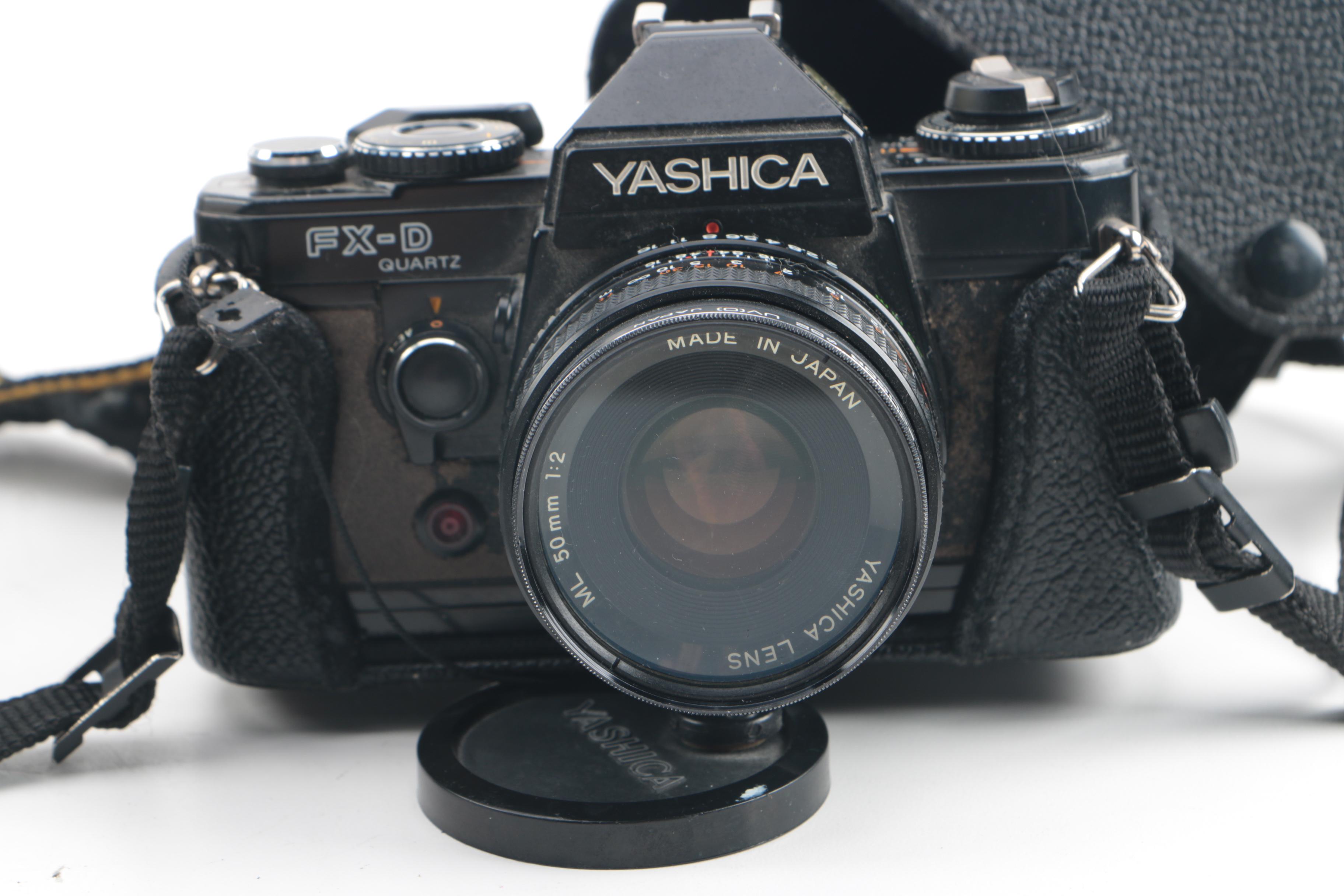 Vintage Yashica Electro 35 and FX-D Quartz Cameras with Cases and Accessories