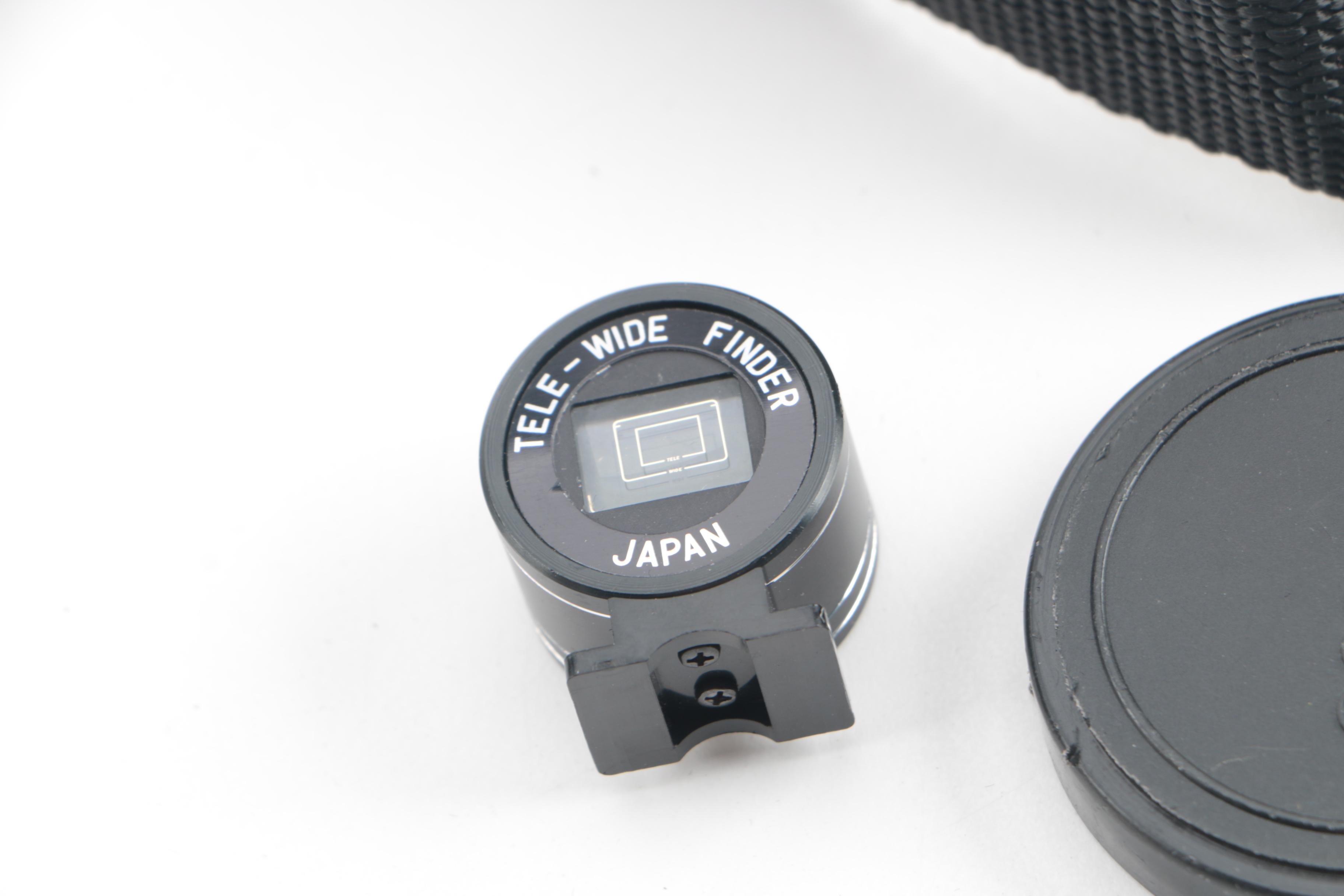 Vintage Yashica Electro 35 and FX-D Quartz Cameras with Cases and Accessories