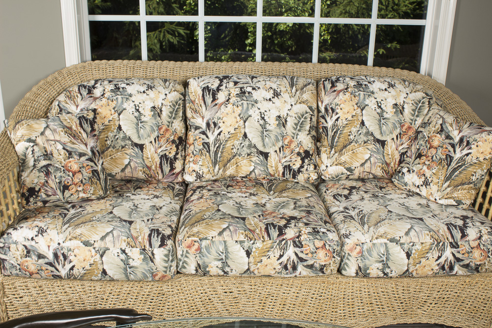 BenchCraft Wicker Patio Sofa with Floral Cushions