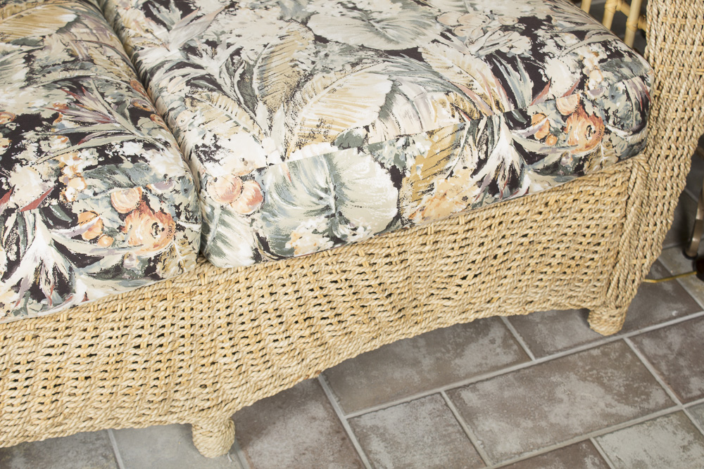 BenchCraft Wicker Patio Sofa with Floral Cushions