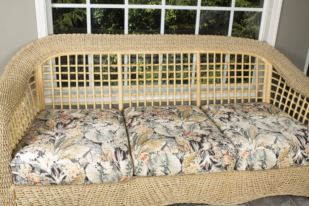 BenchCraft Wicker Patio Sofa with Floral Cushions